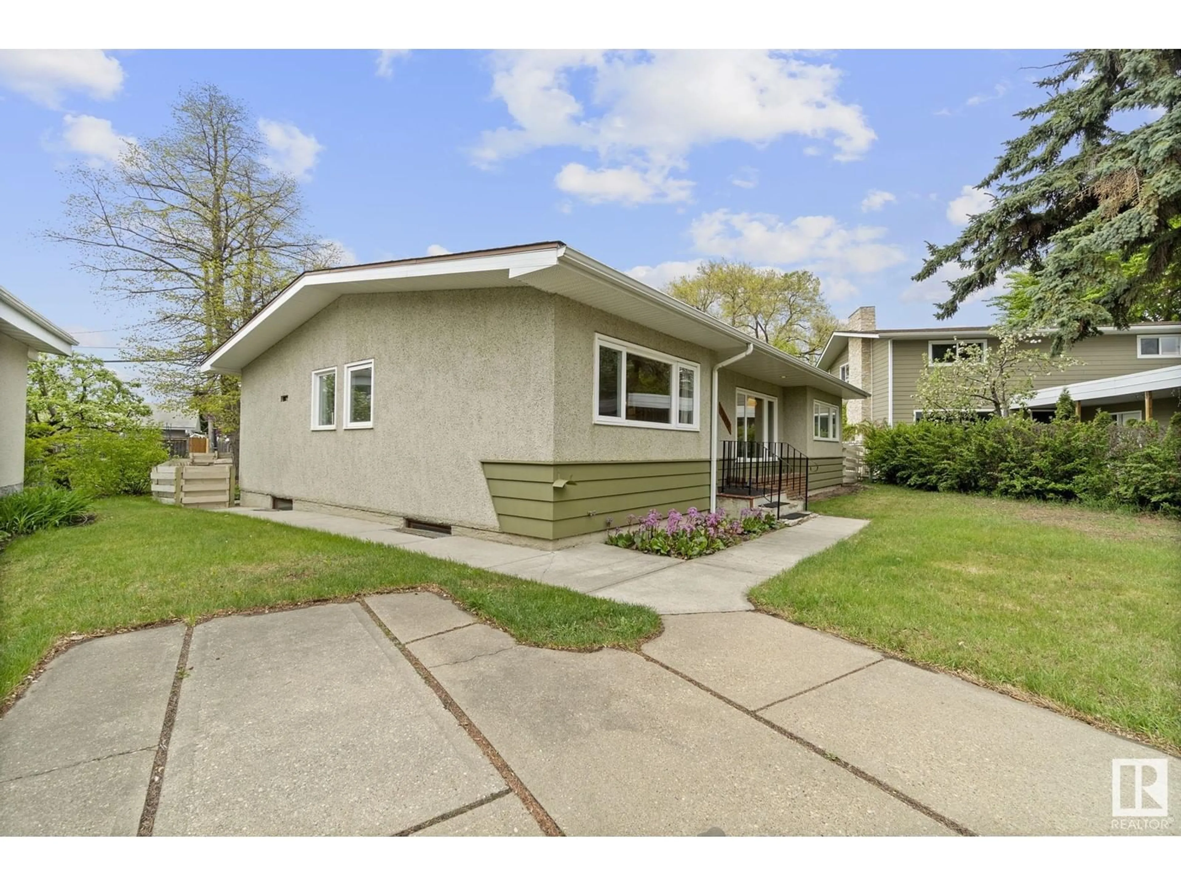 Home with vinyl exterior material, street for 16413 87A AV, Edmonton Alberta T6R4H8