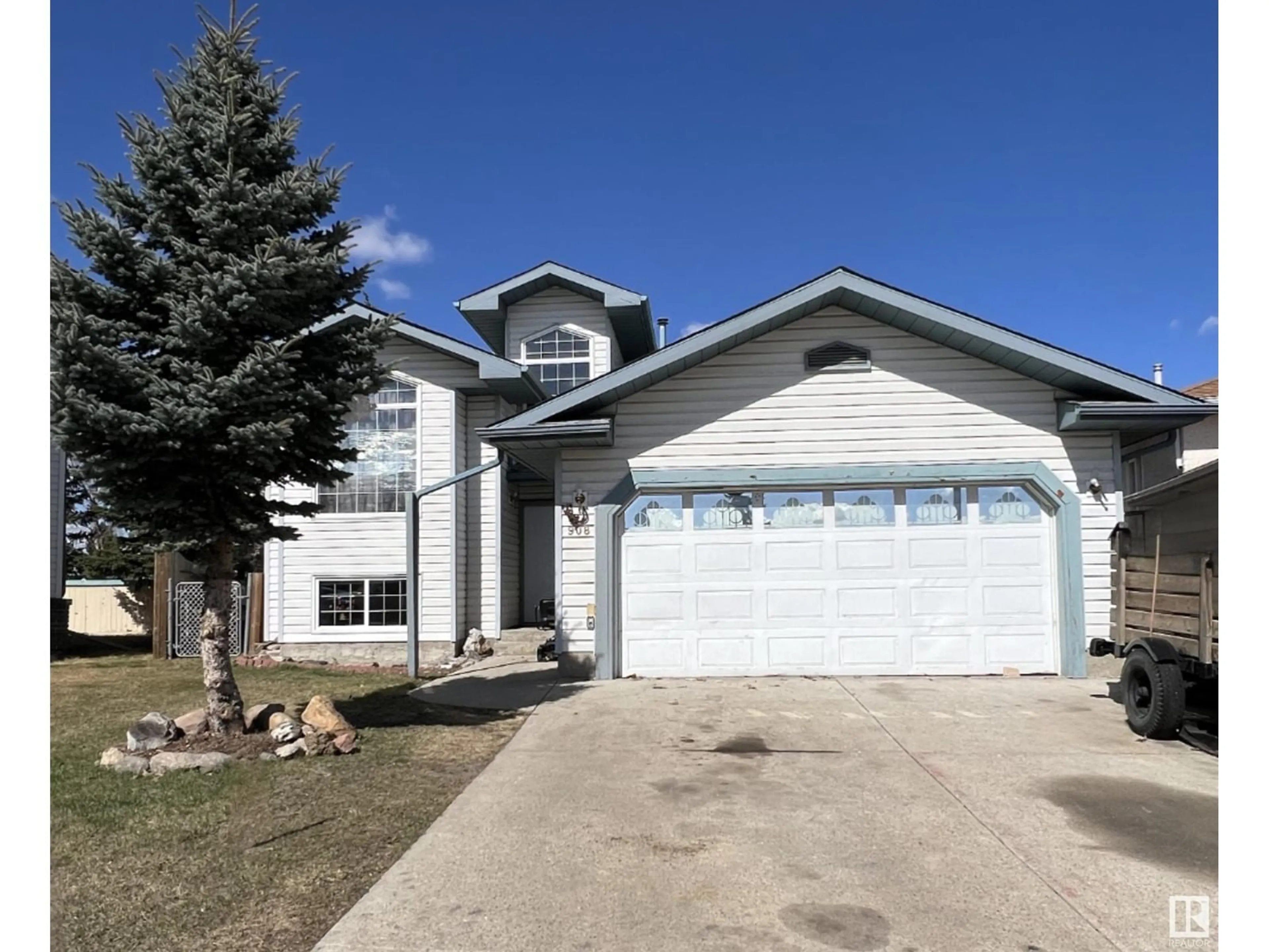 Home with vinyl exterior material, street for 908 JORDAN CR, Edmonton Alberta T6L6X5