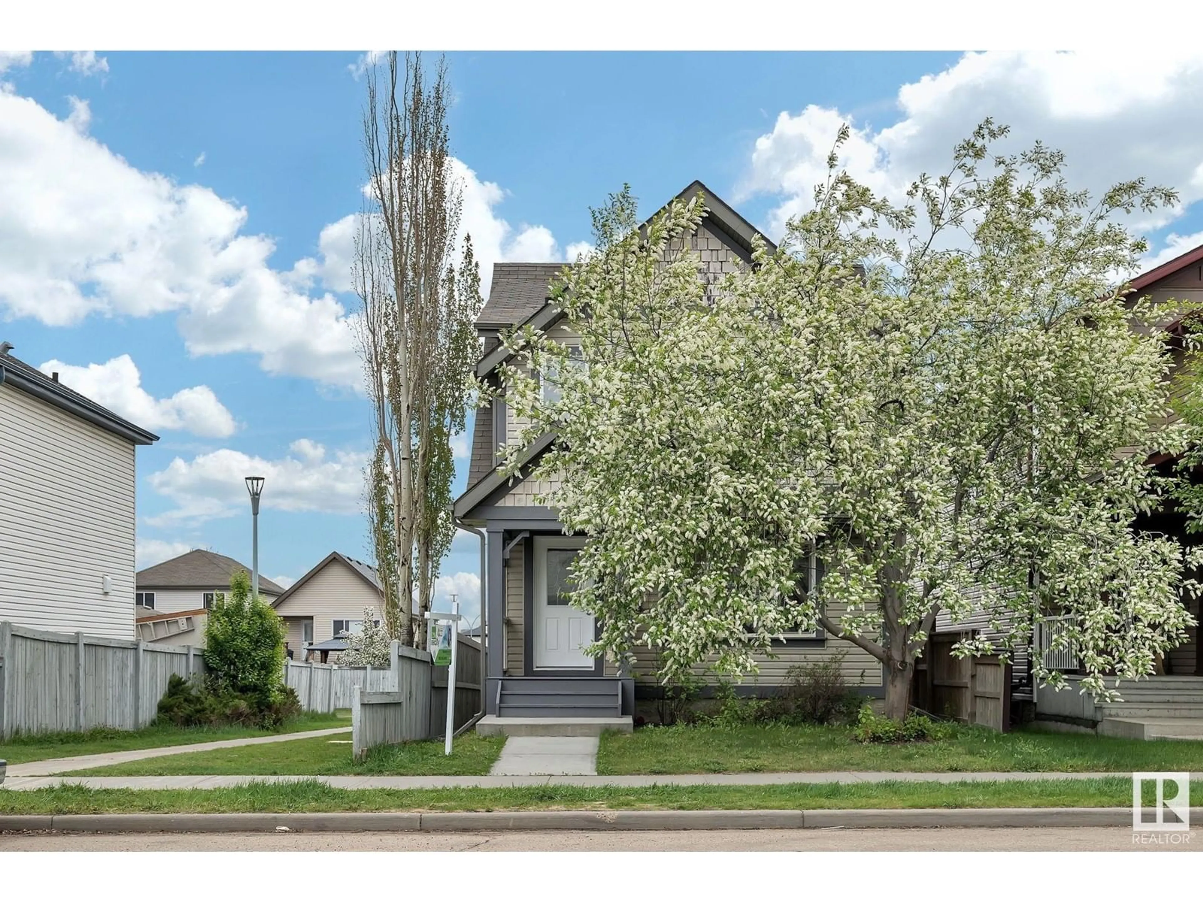 Home with vinyl exterior material, street for NW - 14771 141 ST, Edmonton Alberta T6V0A7