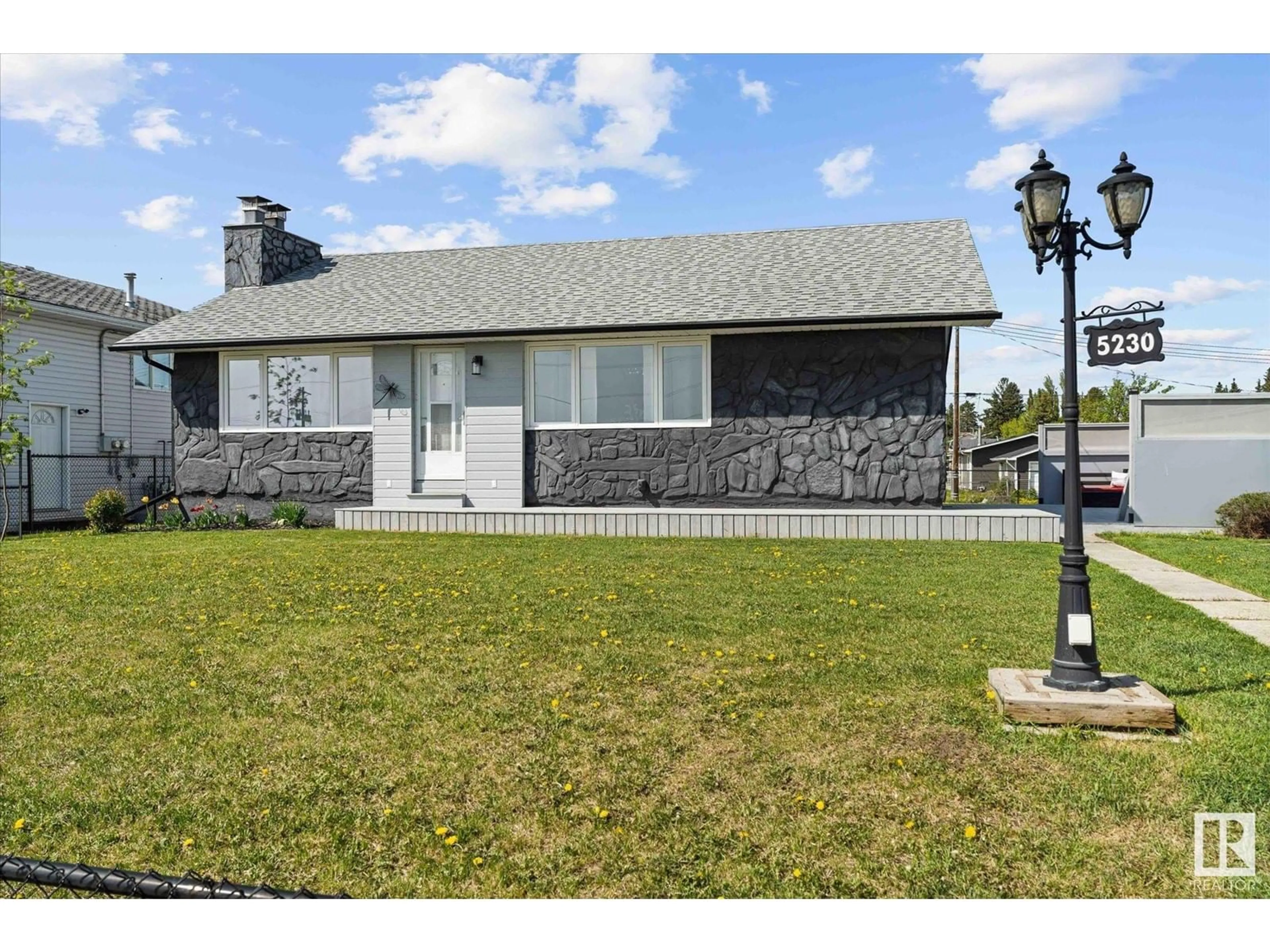 Home with vinyl exterior material, street for 5230 51 AV, Wabamun Alberta T0E0K0