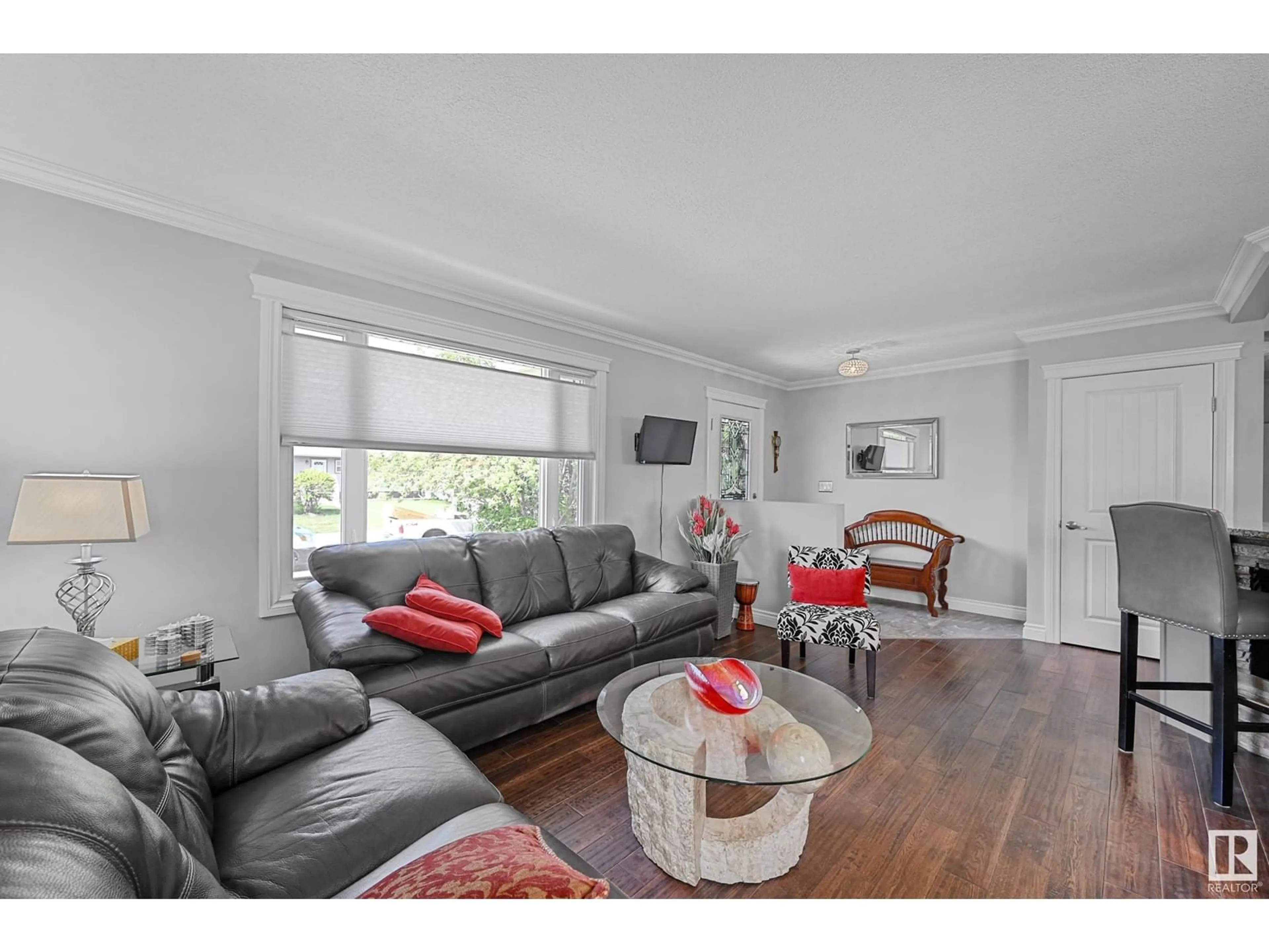 Living room with furniture, wood/laminate floor for NW - 8915 148 ST, Edmonton Alberta T5R0Z8