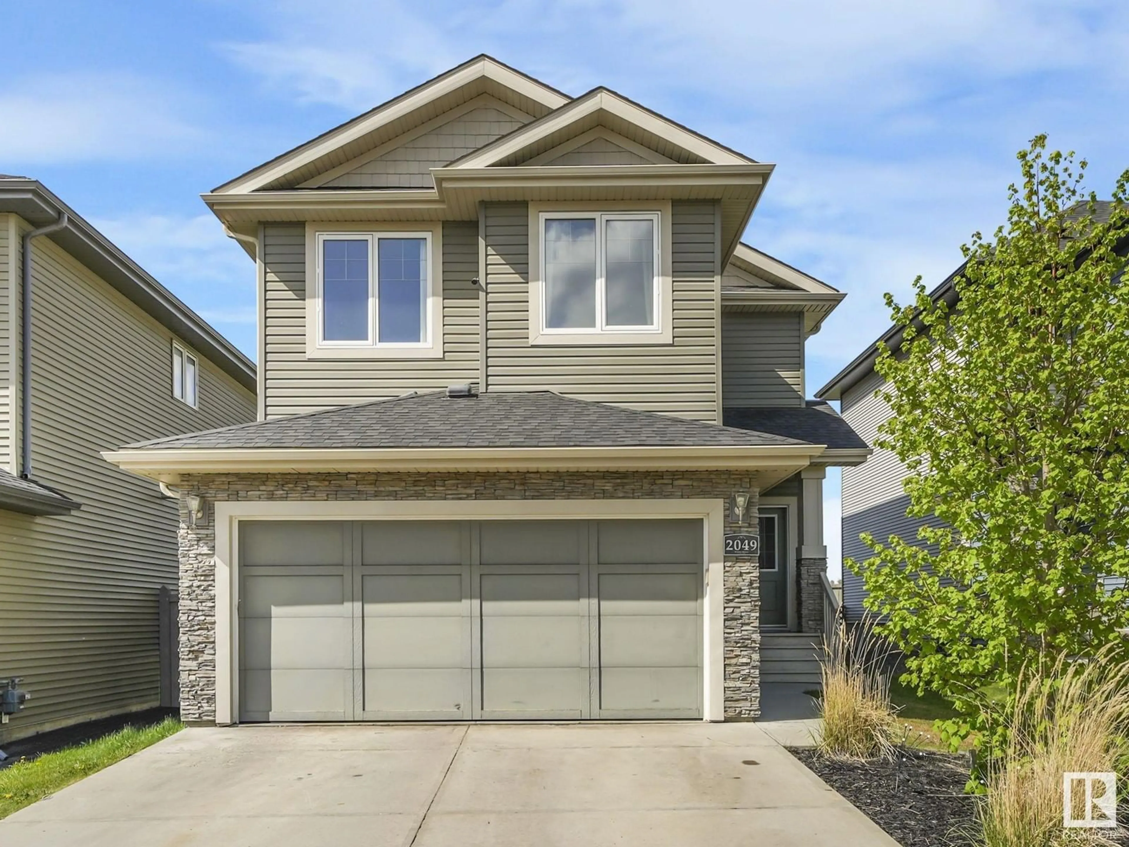 Home with vinyl exterior material, street for NW - 2049 REDTAIL CM, Edmonton Alberta T5S0H3