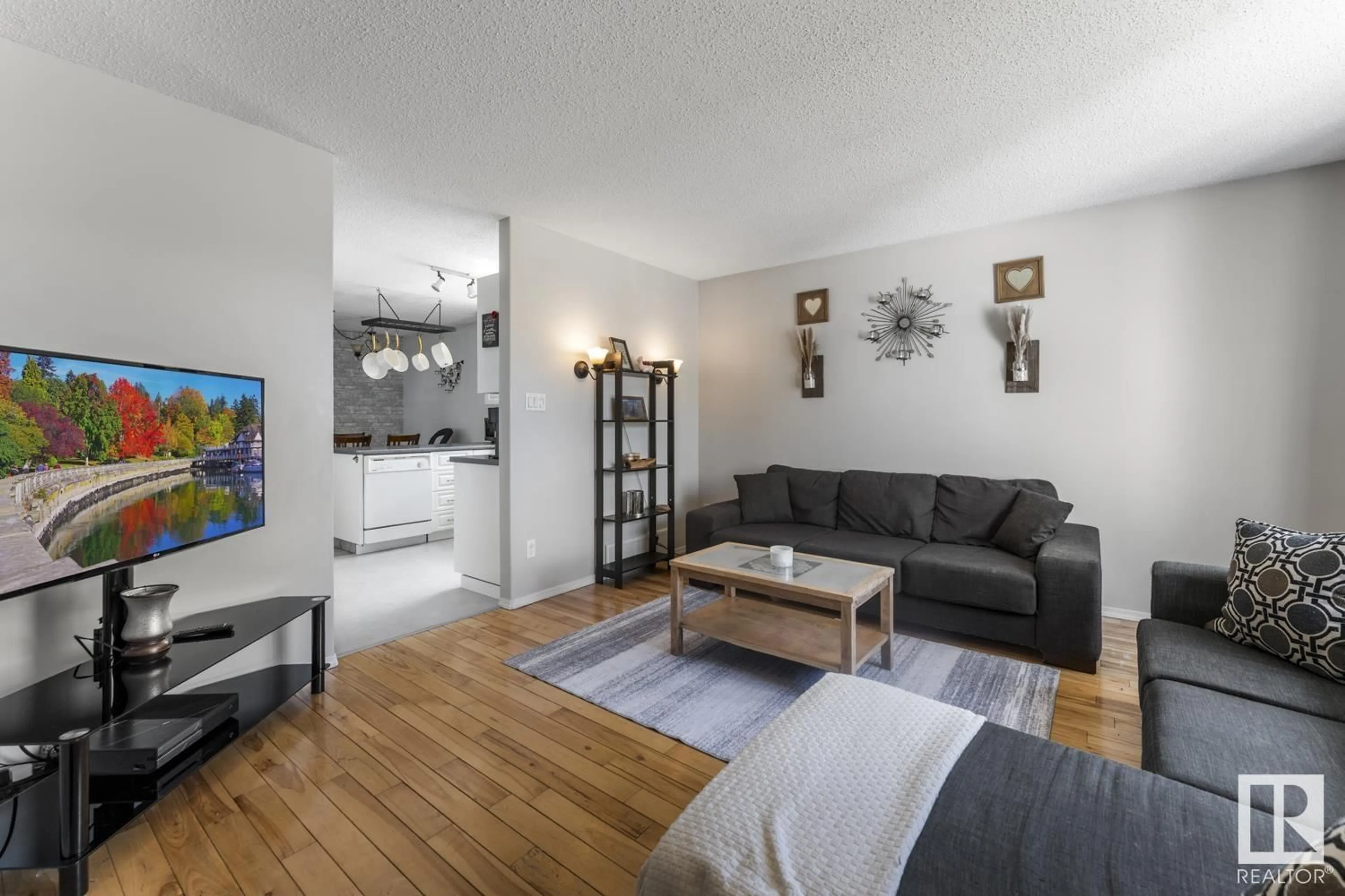 Living room with furniture, wood/laminate floor for 4910 51 AV, Cold Lake Alberta T9M1X2