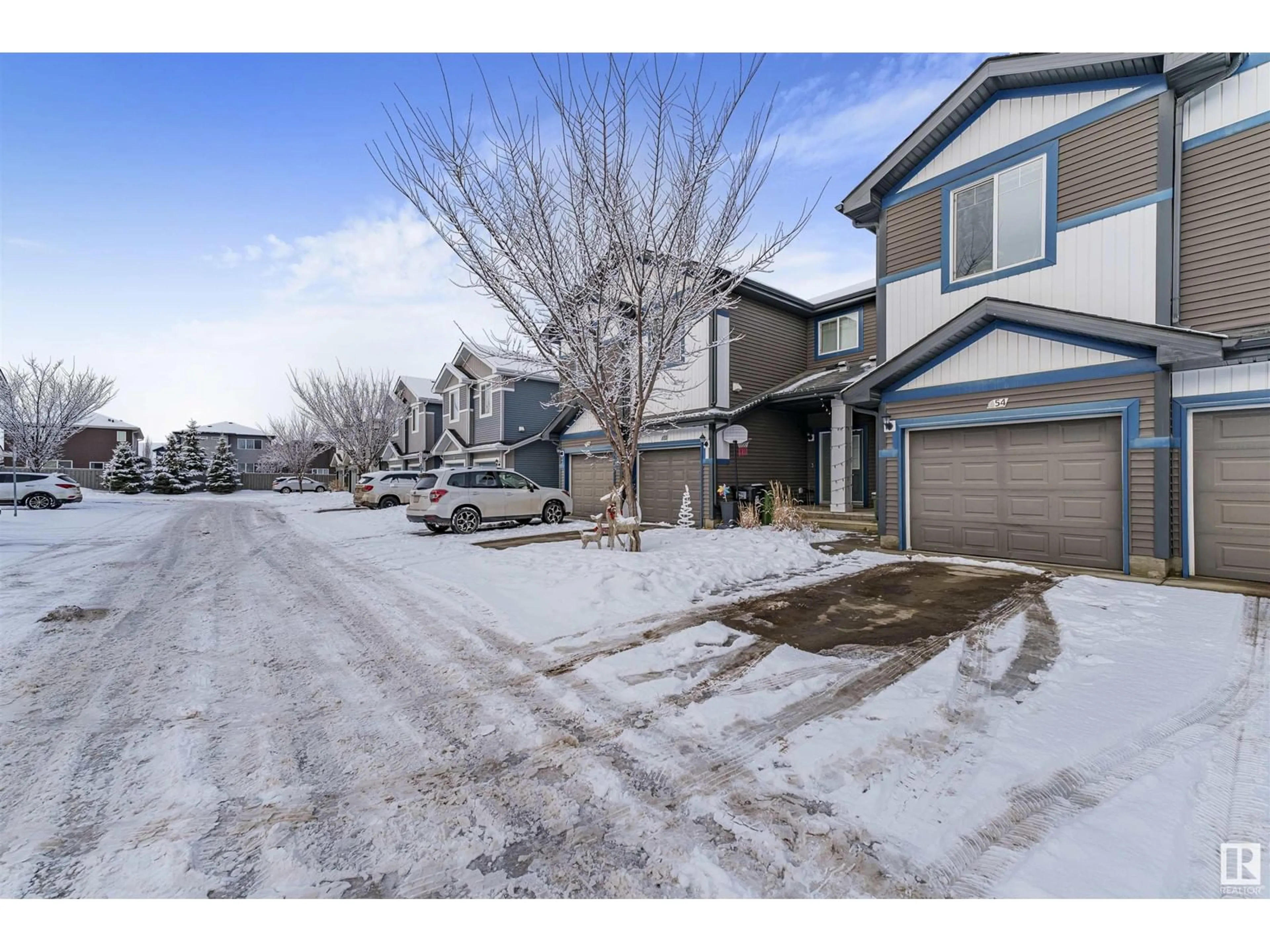 A pic from outside/outdoor area/front of a property/back of a property/a pic from drone, street for 8209 - 54 217 ST, Edmonton Alberta T5T6Z4