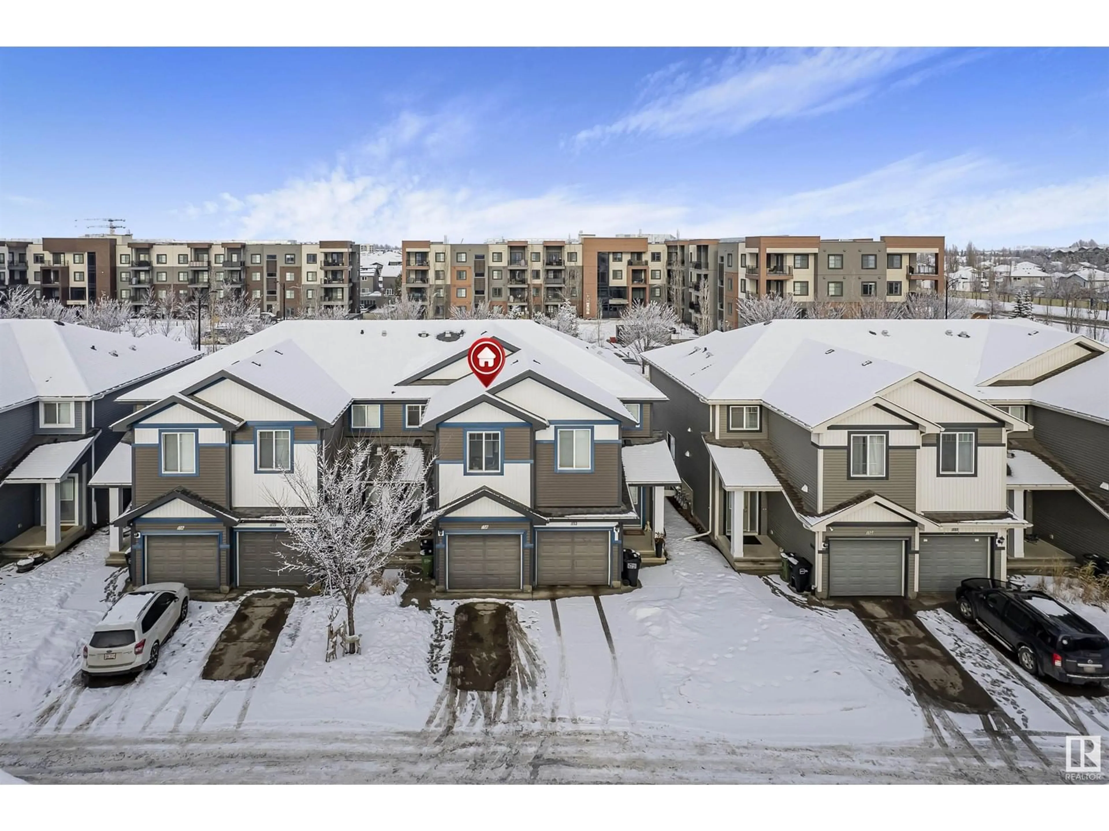 A pic from outside/outdoor area/front of a property/back of a property/a pic from drone, mountain view for 8209 - 54 217 ST, Edmonton Alberta T5T6Z4