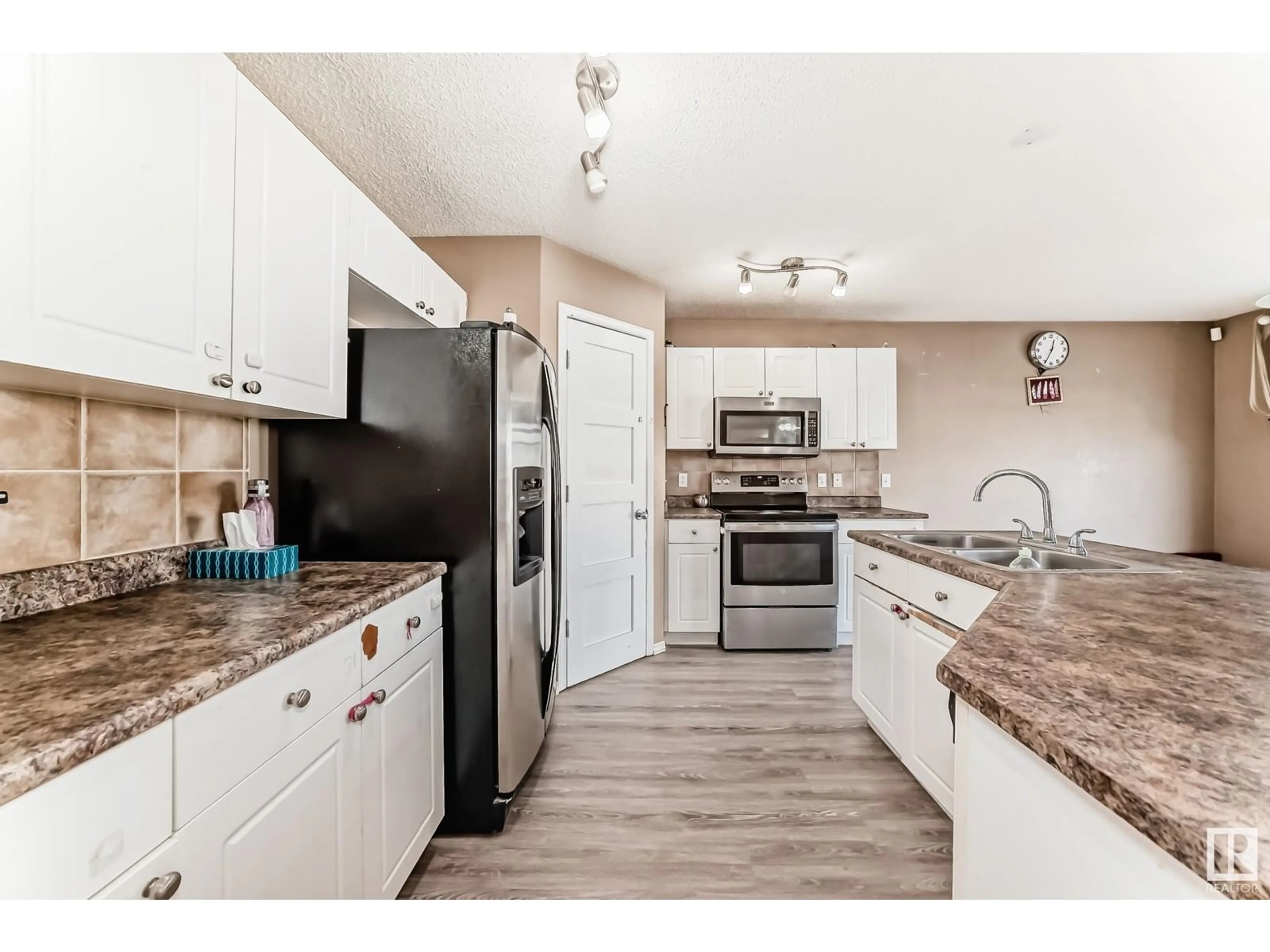 Open concept kitchen, unknown for 2328 32 AV, Edmonton Alberta T6T1Z7