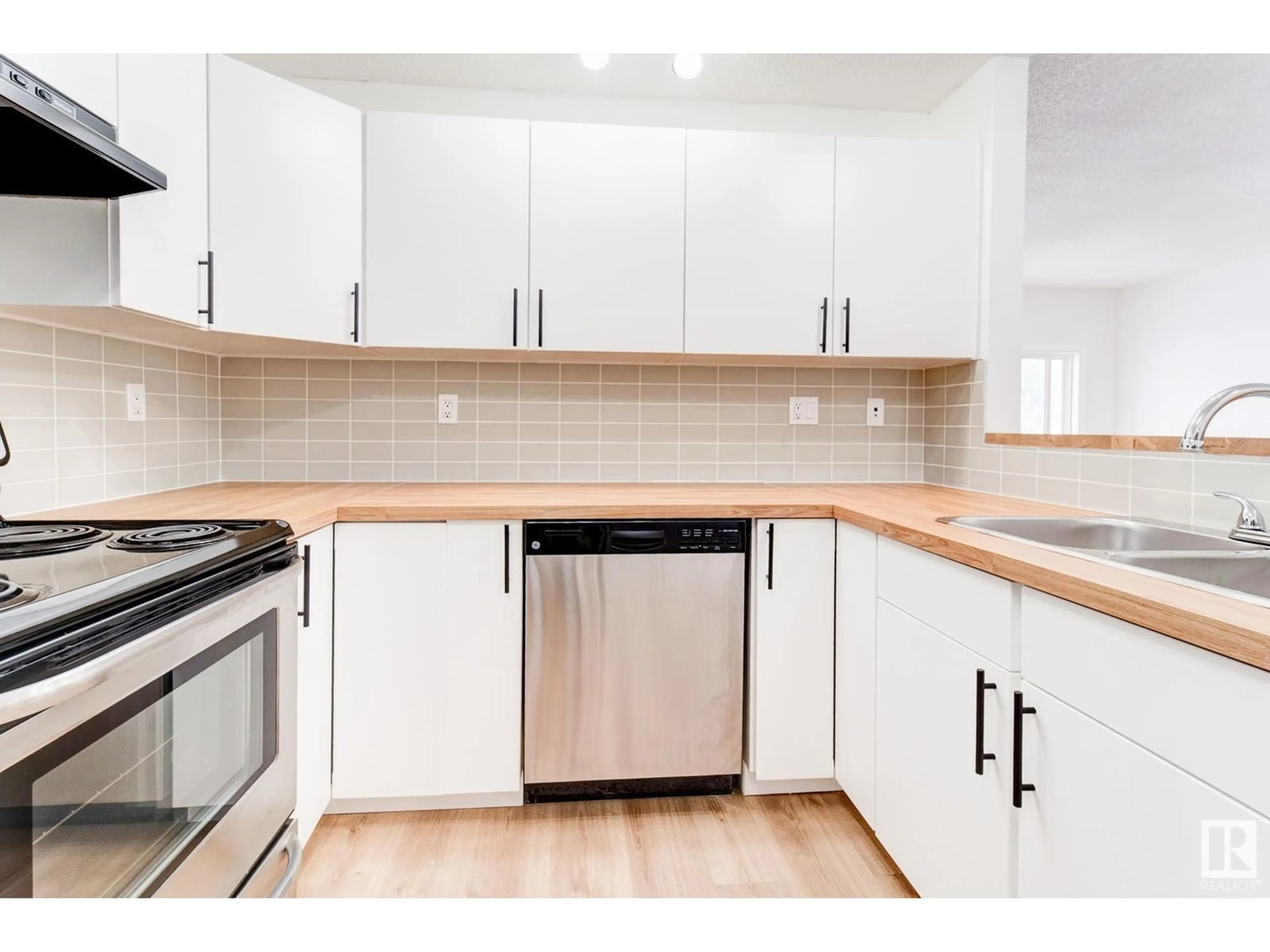 Standard kitchen, wood/laminate floor for 109 - 3040 SPENCE WD, Edmonton Alberta T6X1N7