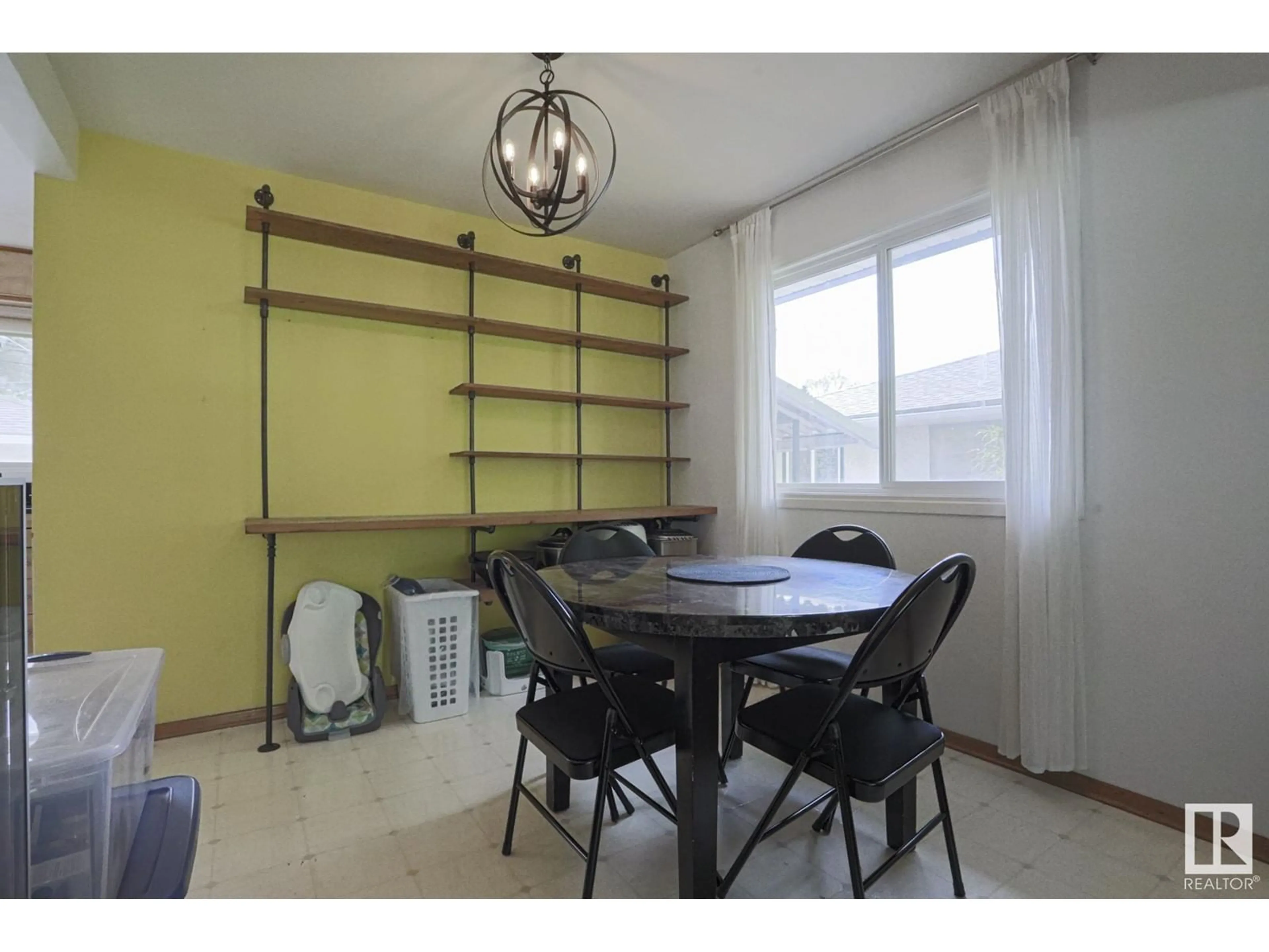 Dining room, wood/laminate floor for NW - 12207 58 ST, Edmonton Alberta T5W3X6