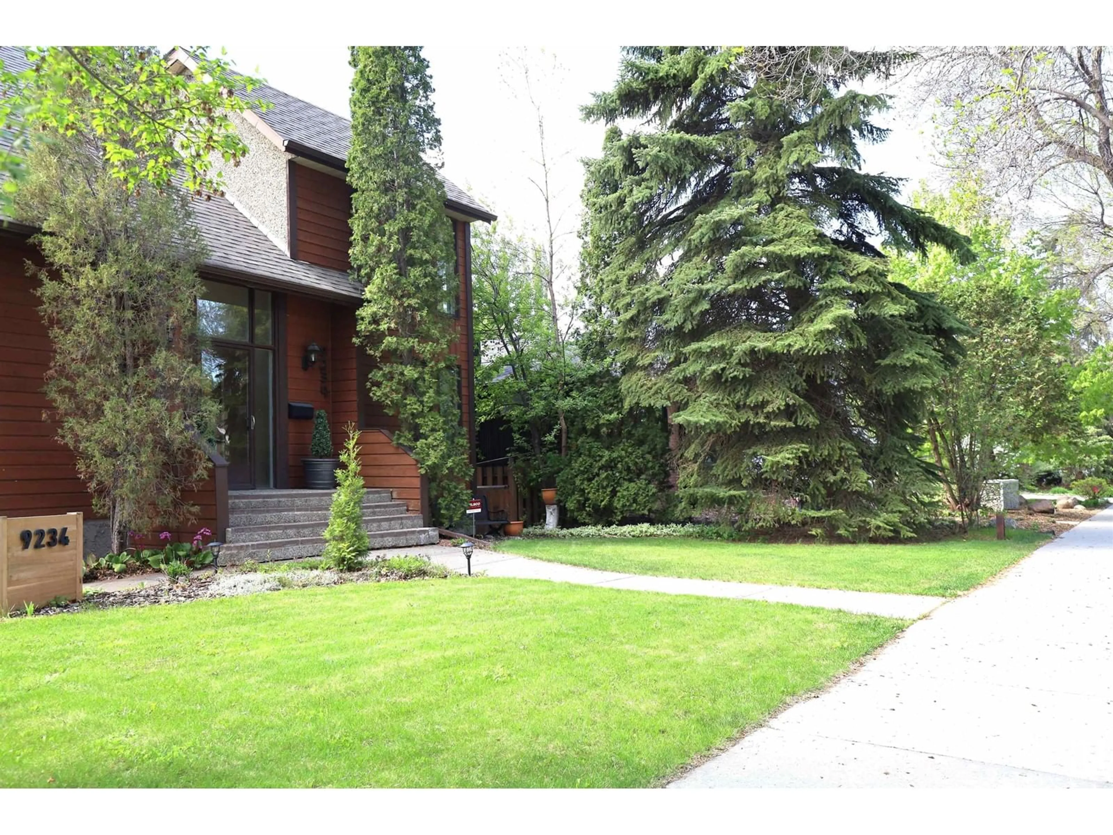 Home with brick exterior material, street for 9234 95 ST, Edmonton Alberta T6C3W8