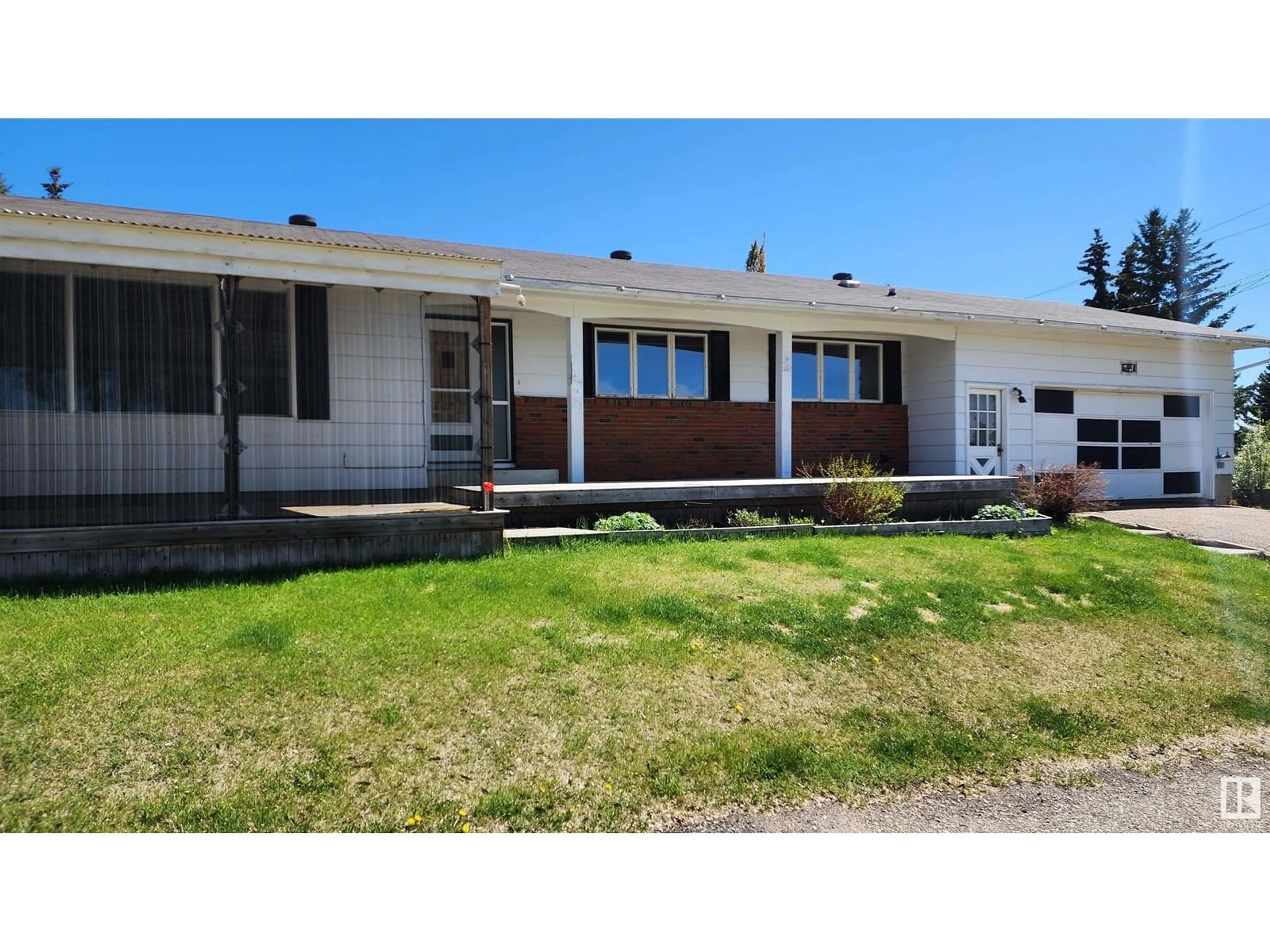 Home with vinyl exterior material, street for 5413 50 ST, Elk Point Alberta T0A1A0