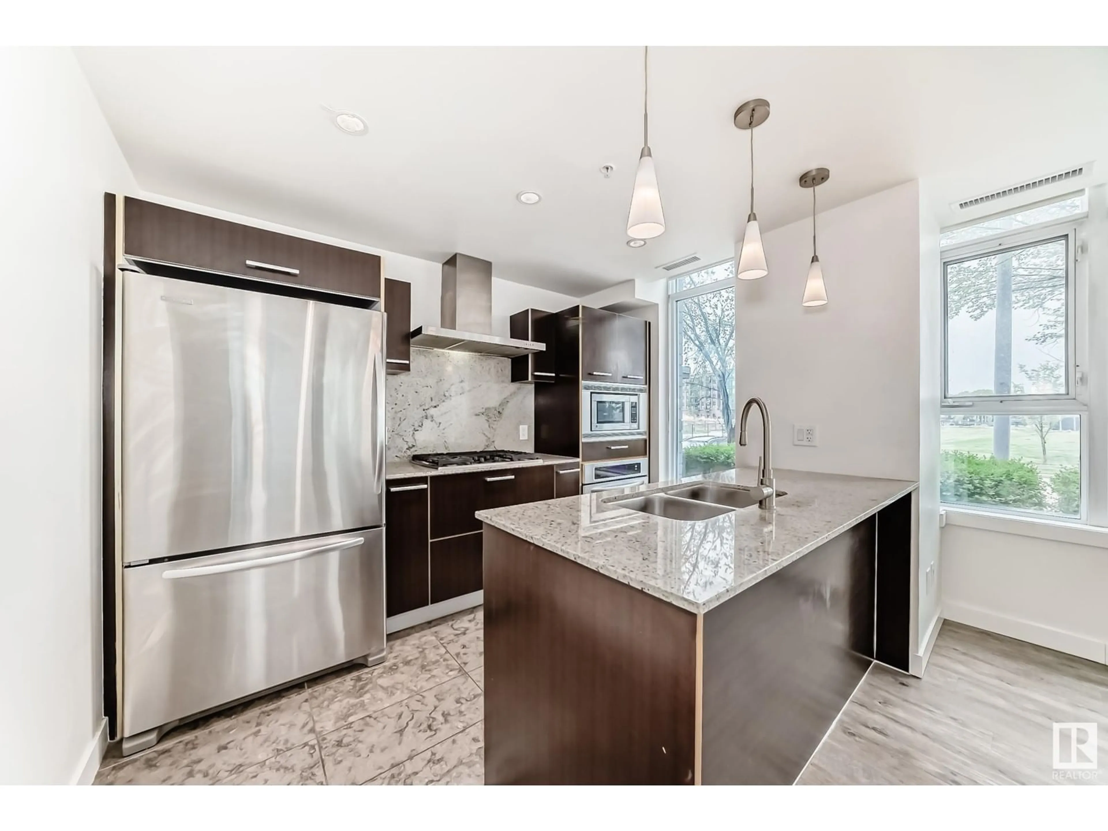 Open concept kitchen, ceramic/tile floor for #101 - 2606 109 ST NW, Edmonton Alberta T6J3S9