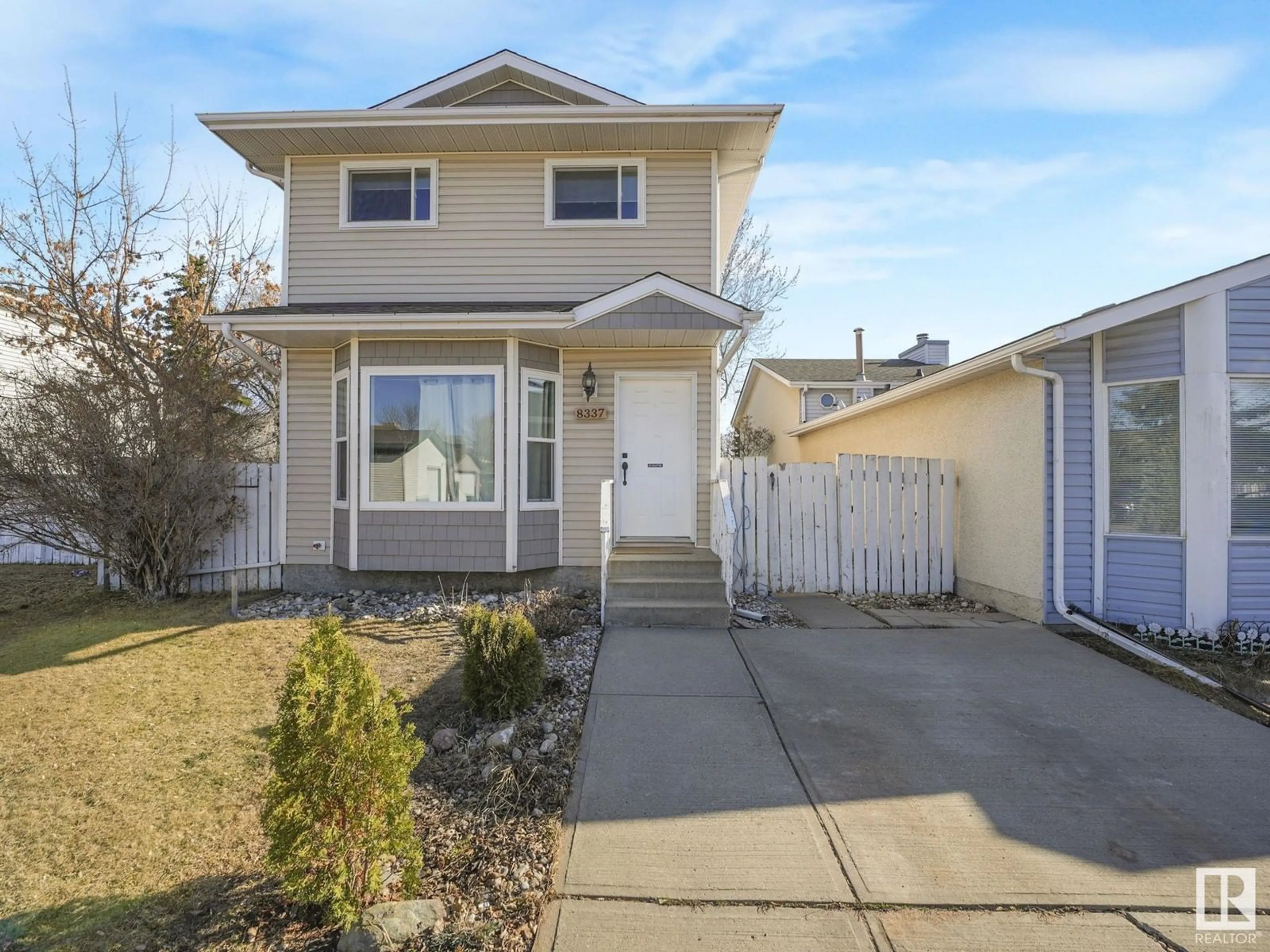 Home with vinyl exterior material, street for 8337 156 AV, Edmonton Alberta T5Z2R5