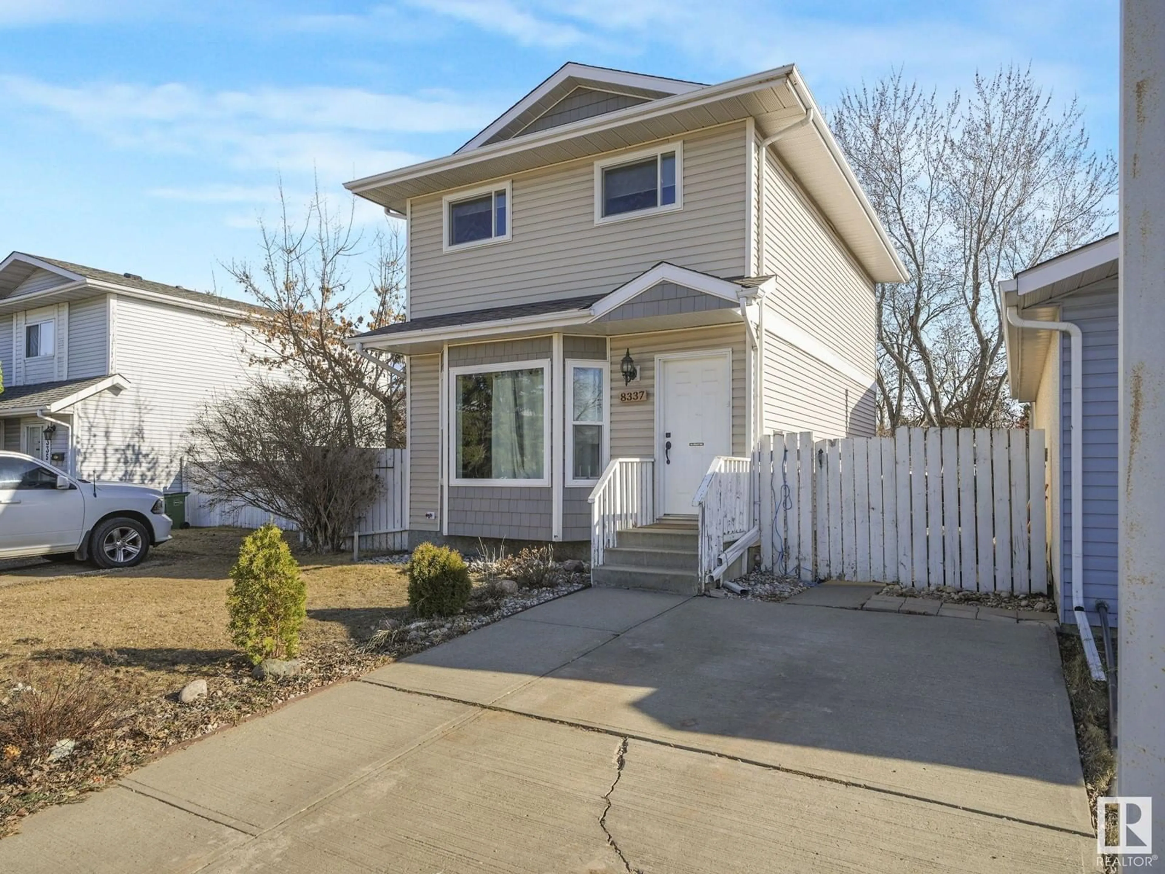 Home with vinyl exterior material, street for 8337 156 AV, Edmonton Alberta T5Z2R5