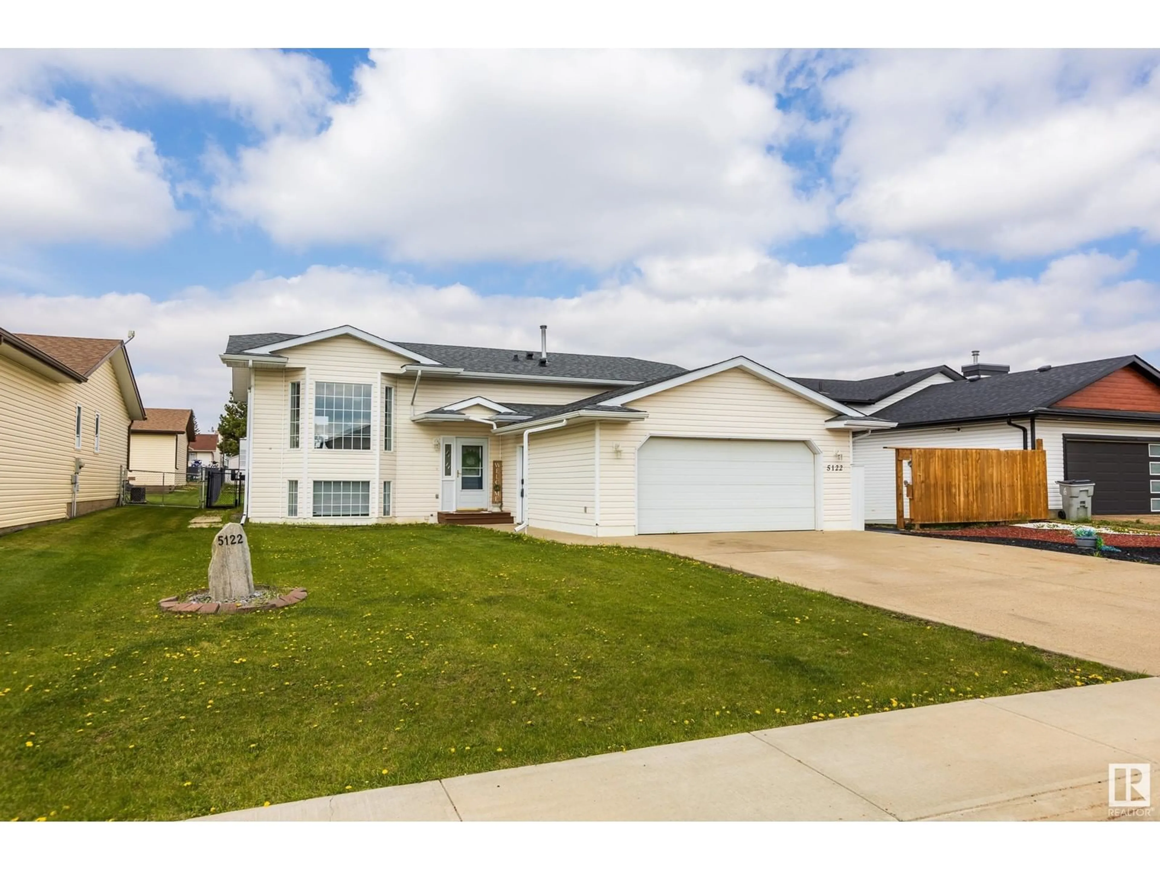 Home with vinyl exterior material, street for 5122 51 ST, Legal Alberta T0G1L0