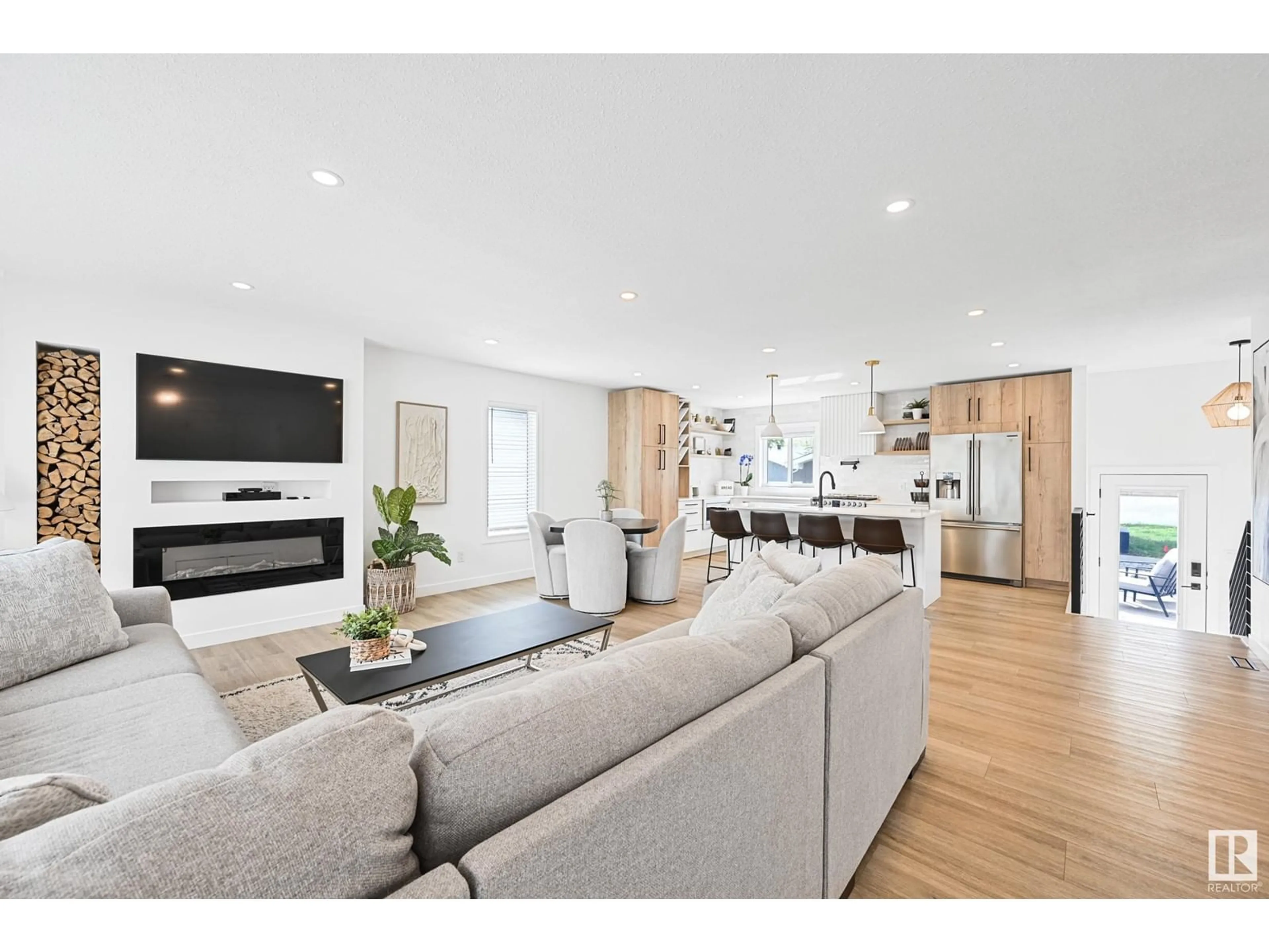 Open concept kitchen, wood/laminate floor for 8909 94 AV, Fort Saskatchewan Alberta T8L1B3