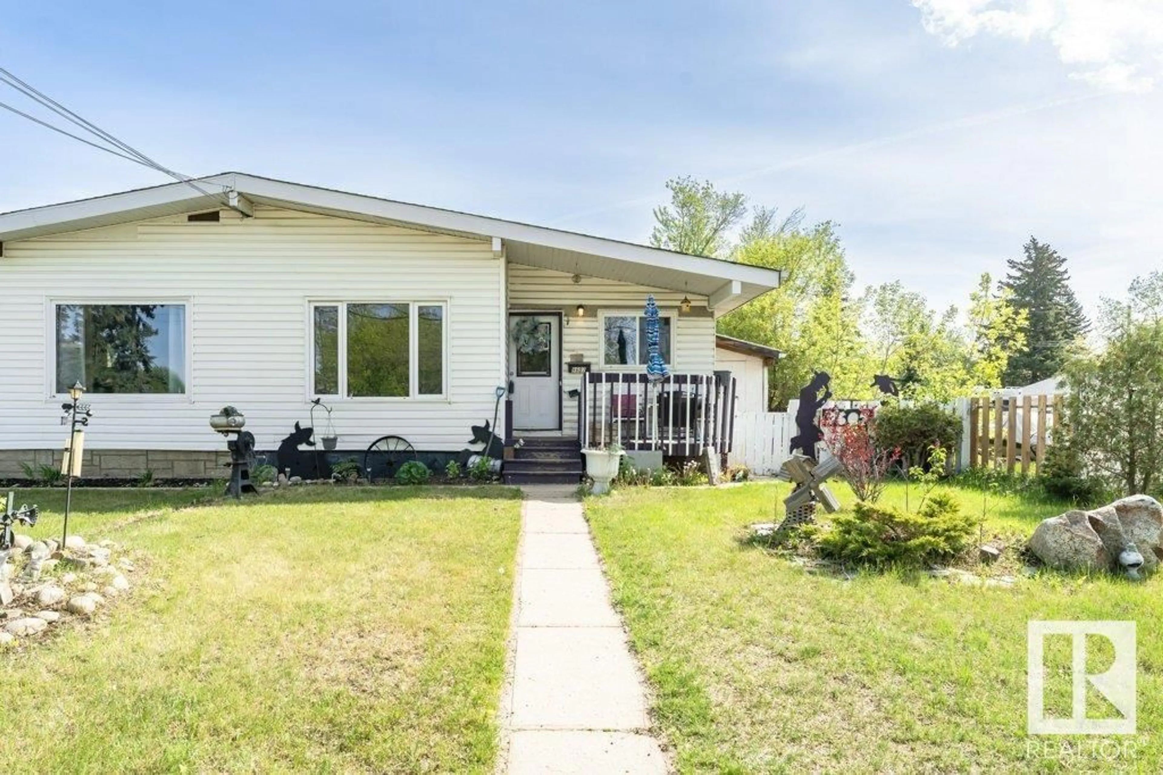 Home with vinyl exterior material, street for 9607 101 ST, Fort Saskatchewan Alberta T8L1T9
