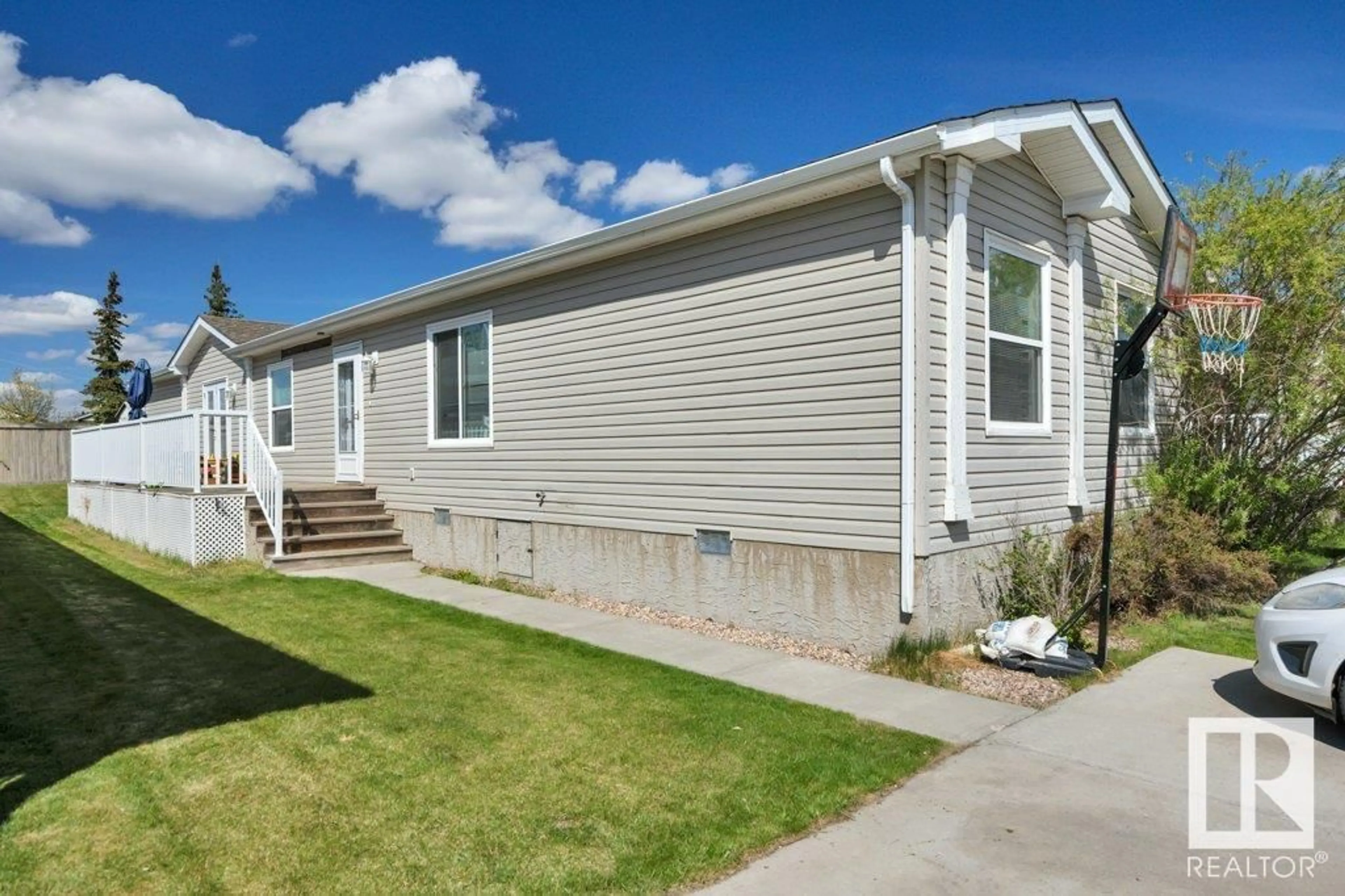 Home with vinyl exterior material, street for 1158 ASPEN DR, Leduc Alberta T9E8R2