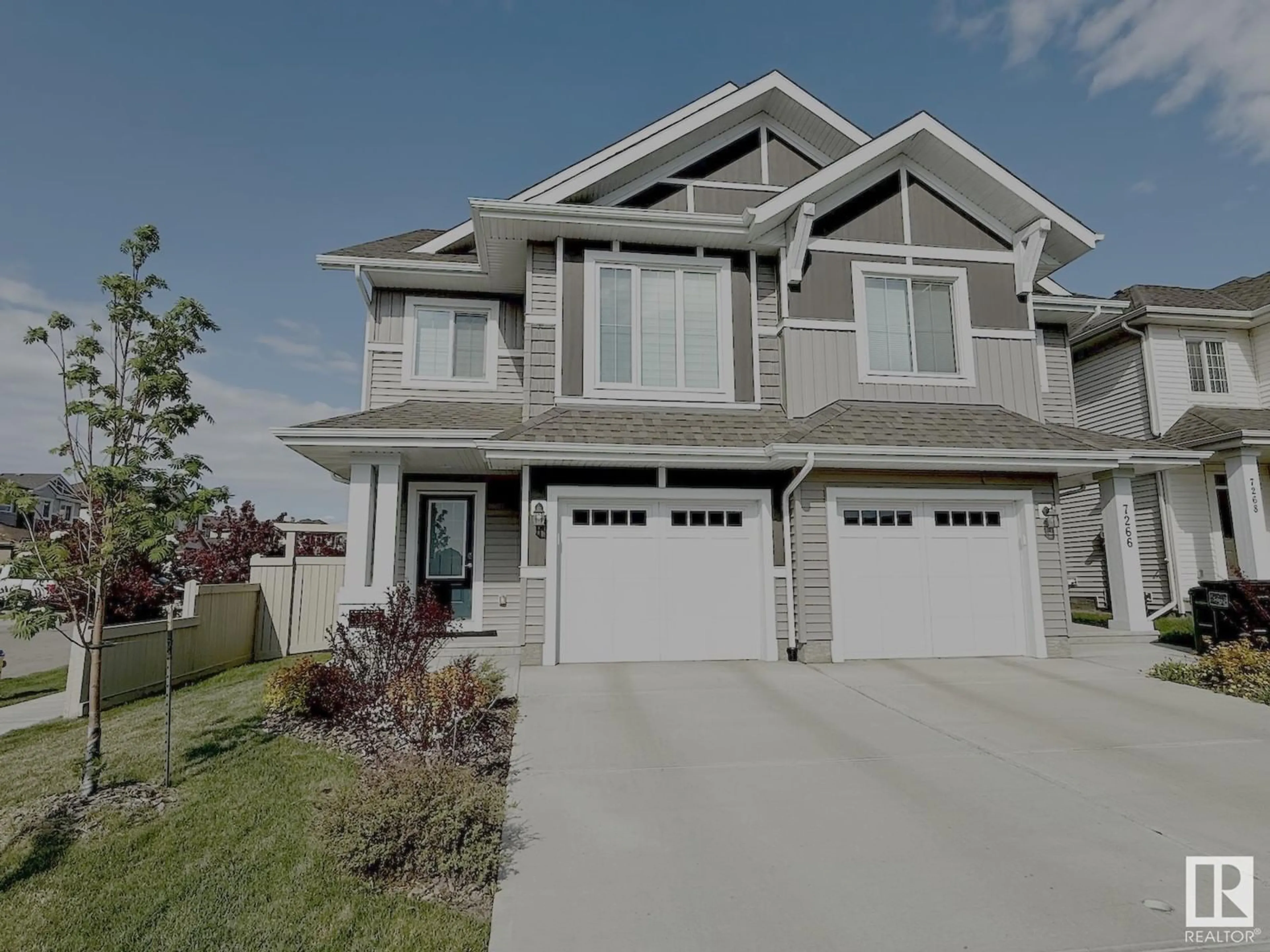 Home with vinyl exterior material, street for 7264 EDGEMONT WY, Edmonton Alberta T6M0W2