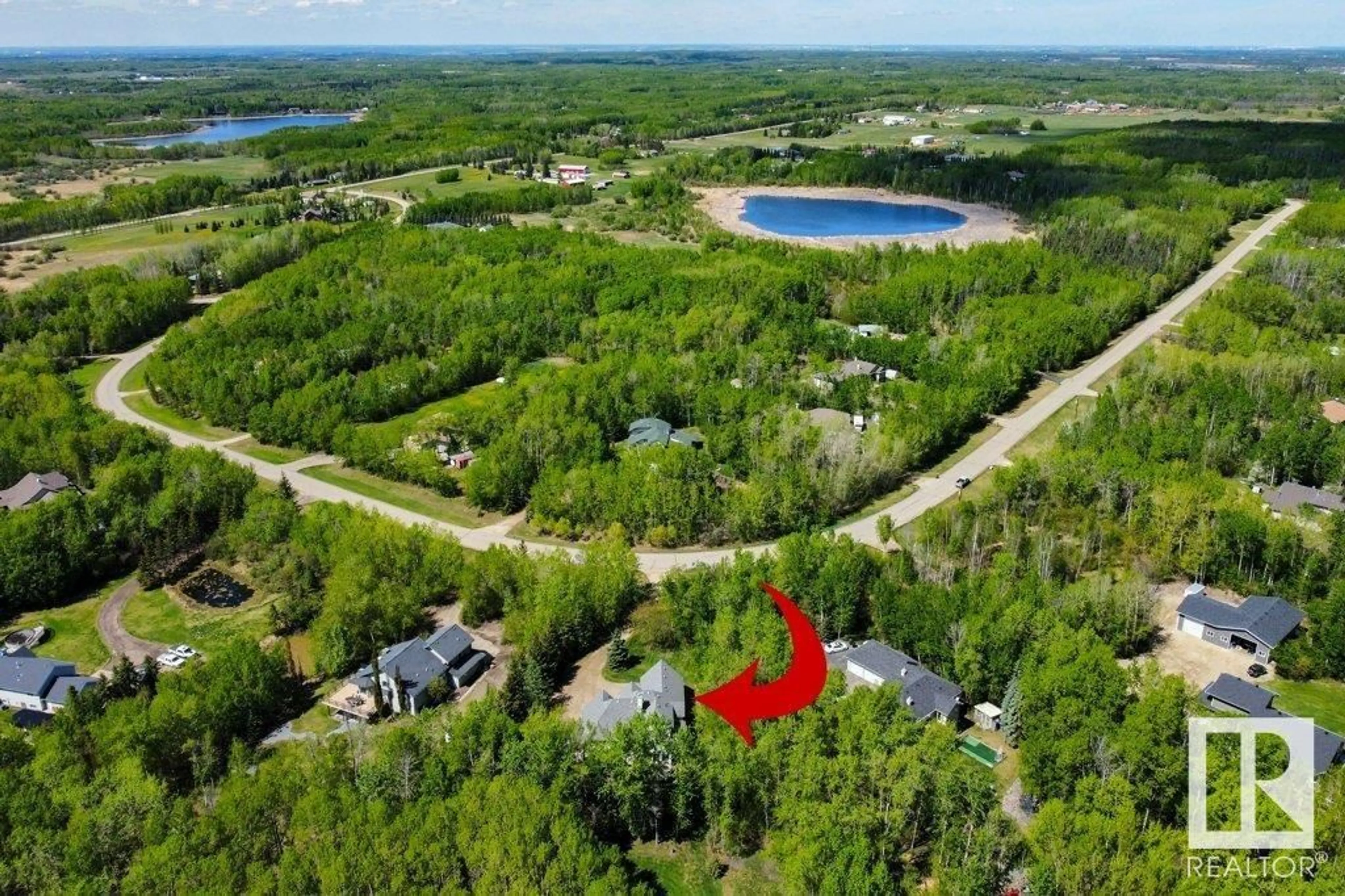 A pic from outside/outdoor area/front of a property/back of a property/a pic from drone, forest/trees view for 181 52465 RGE ROAD 213, Rural Strathcona County Alberta T8G2E8
