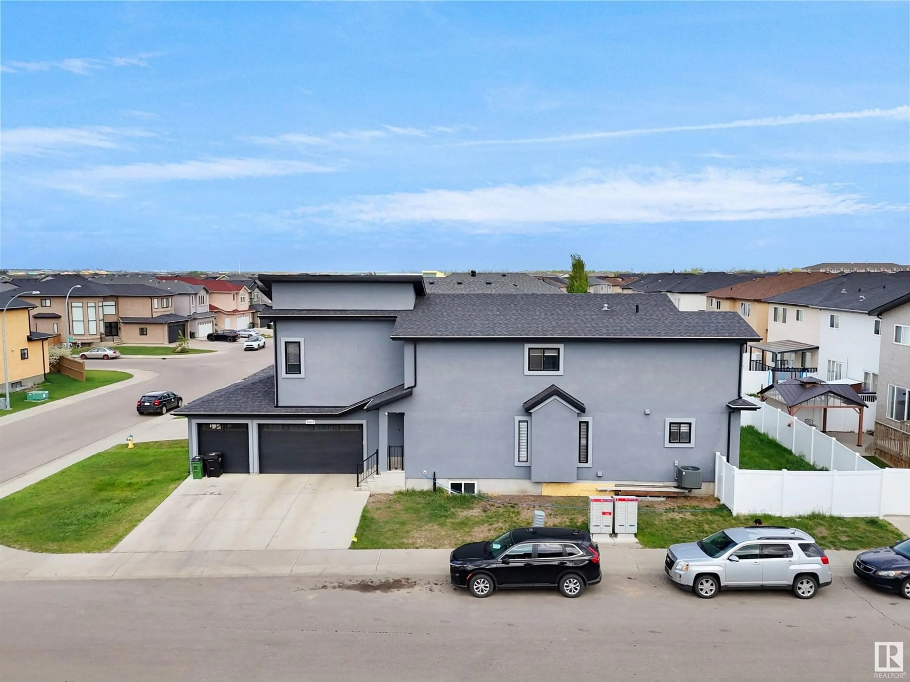 A pic from outside/outdoor area/front of a property/back of a property/a pic from drone, street for 16711 62 ST, Edmonton Alberta T5Y0B6