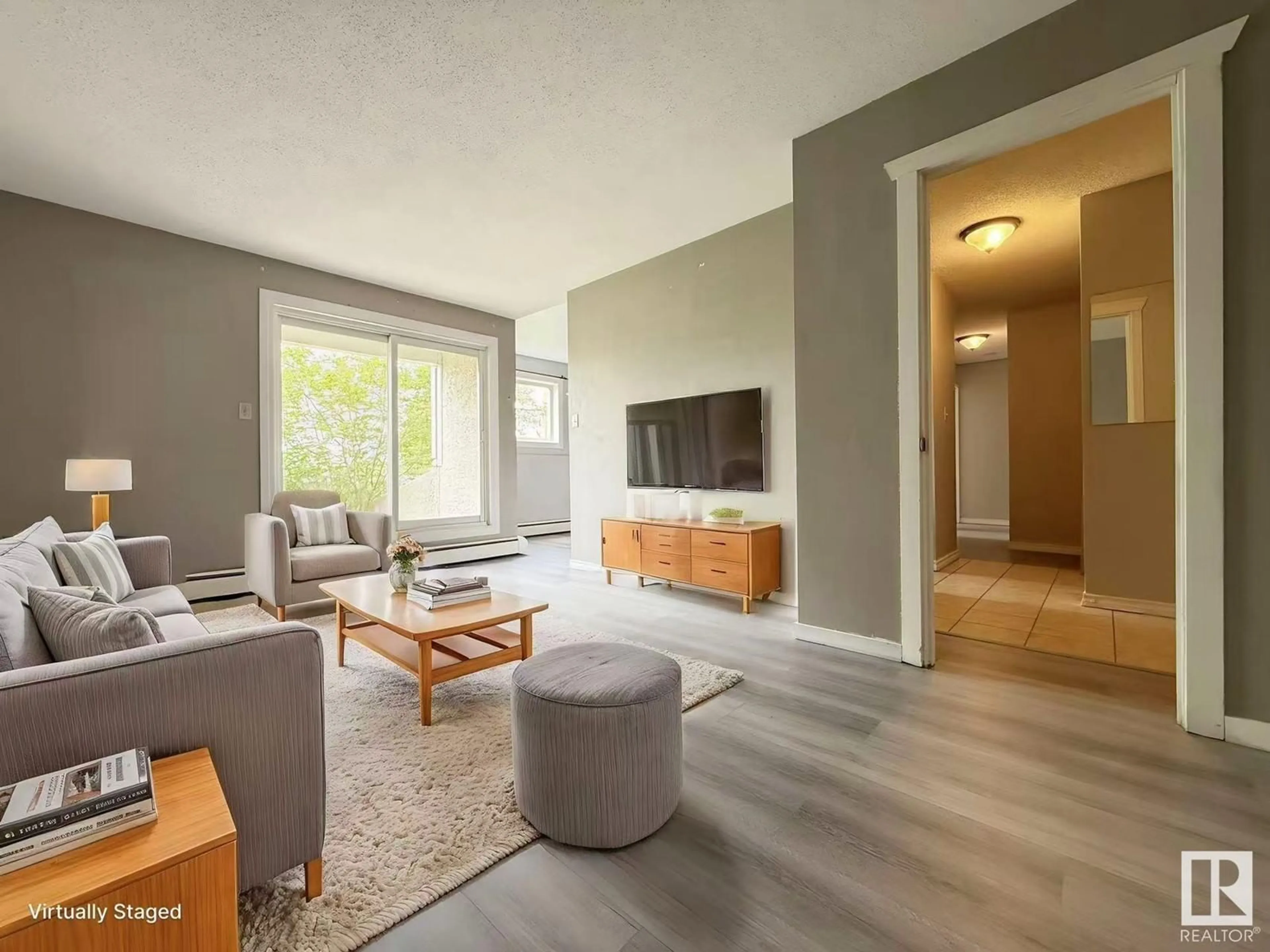 Living room with furniture, wood/laminate floor for #9 - 11245 31 AV, Edmonton Alberta T6J3V5