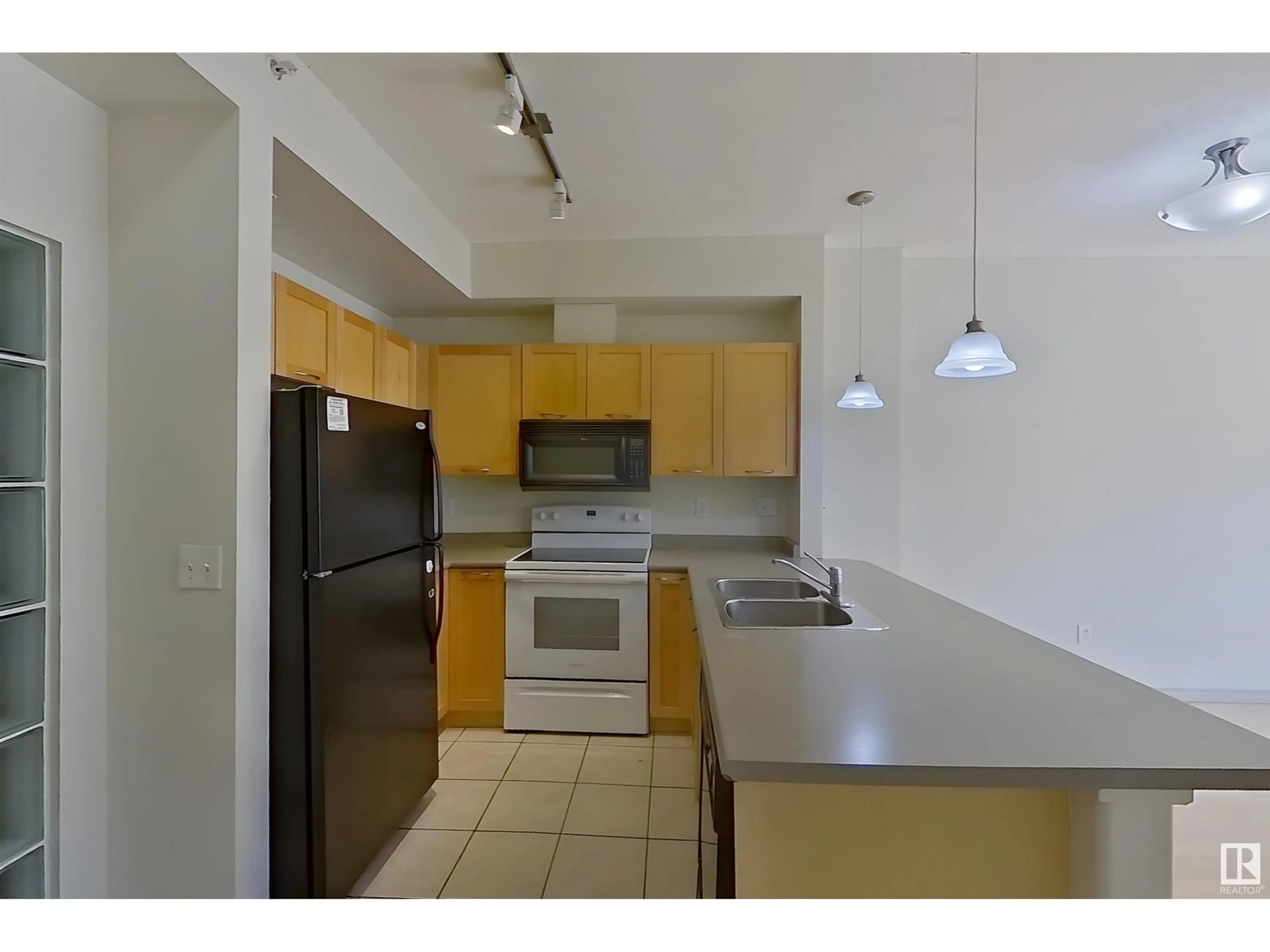 Standard kitchen, unknown for #1-518 - 4245 139 AV NW, Edmonton Alberta T5Y3E8