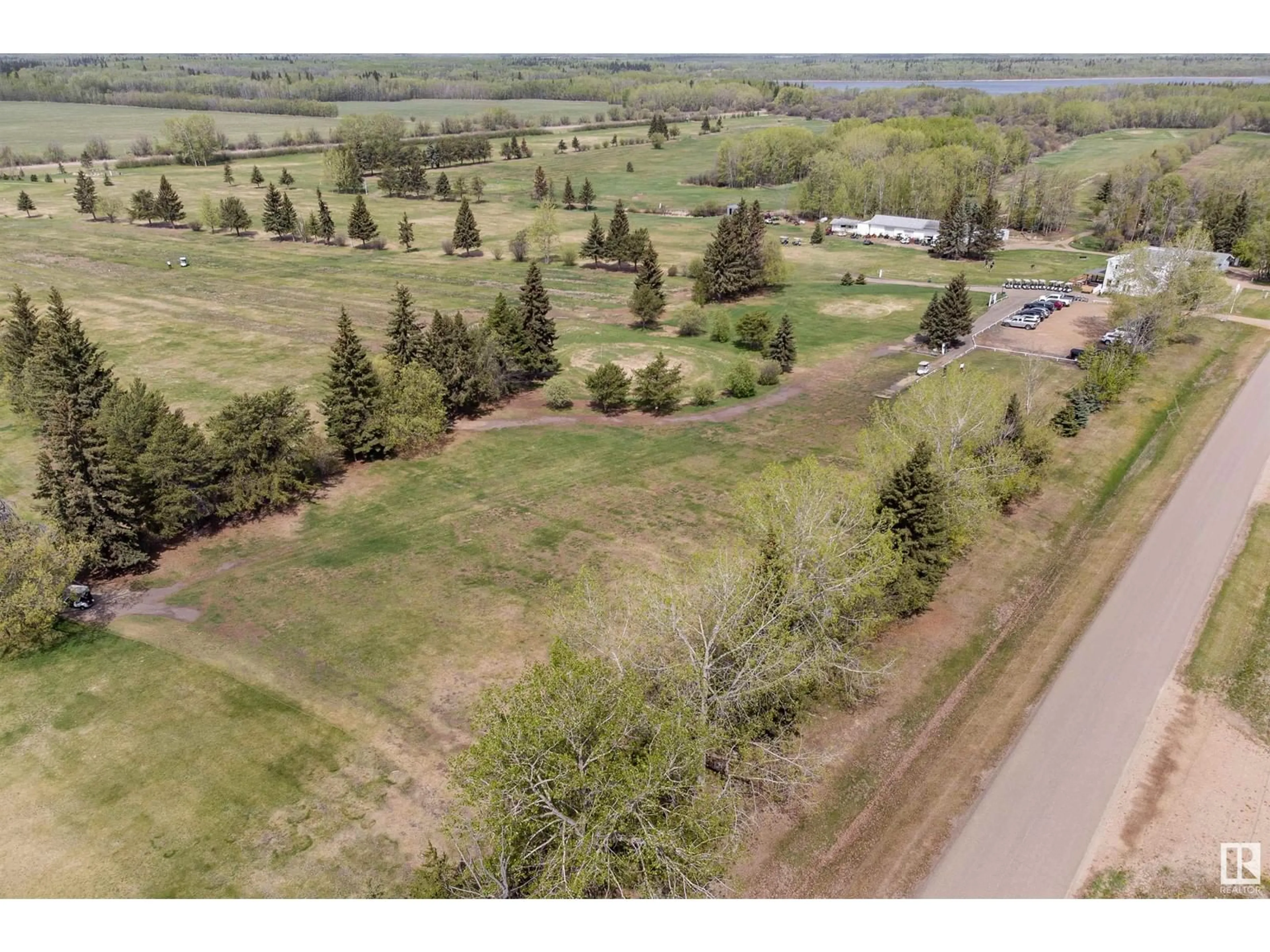 A pic from outside/outdoor area/front of a property/back of a property/a pic from drone, forest/trees view for 59536 - 250 RANGE ROAD 132A NE, Rural Smoky Lake County Alberta T0A3C0
