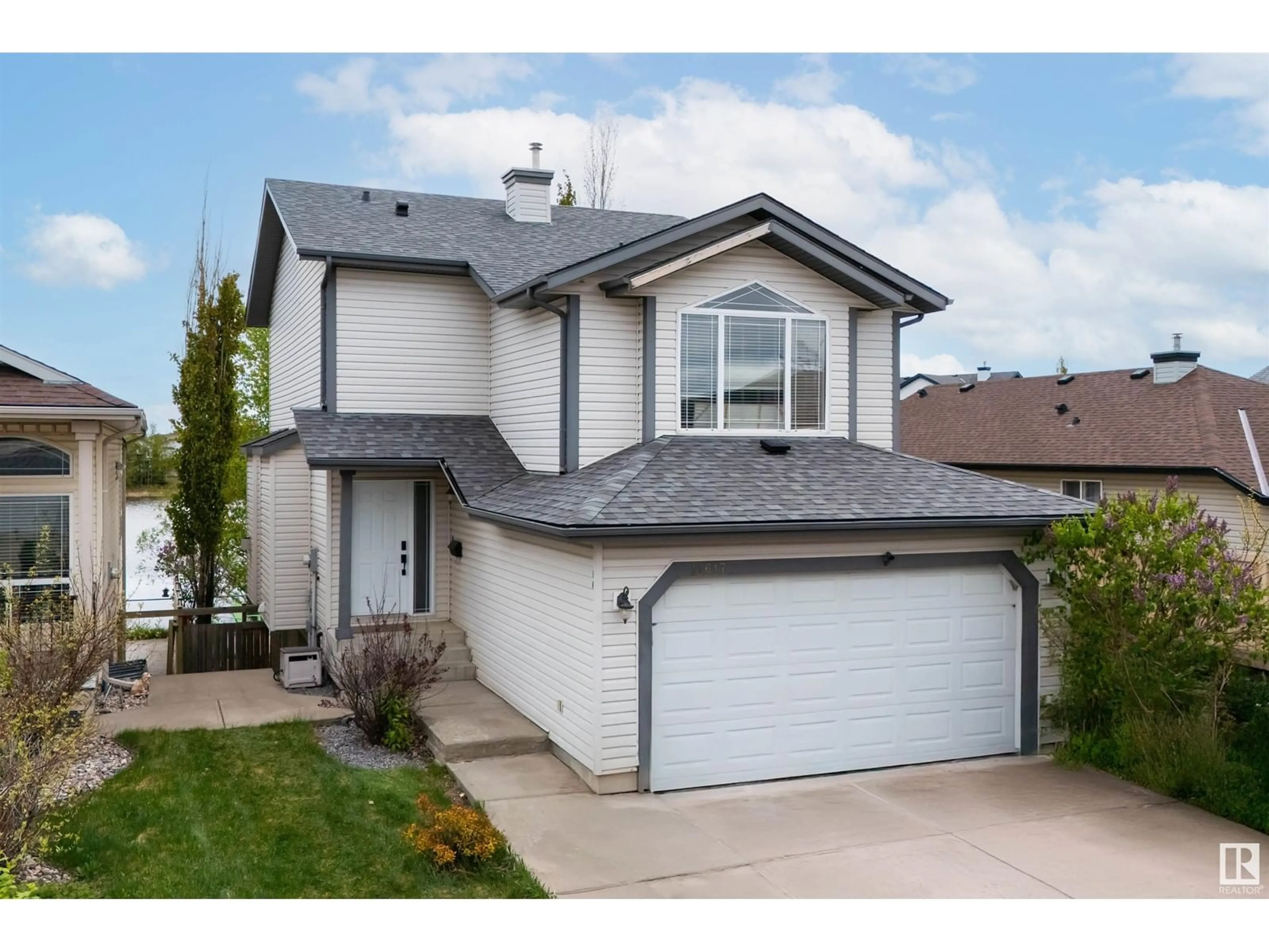 Home with vinyl exterior material, street for 11617 173A AV, Edmonton Alberta T5X6C5