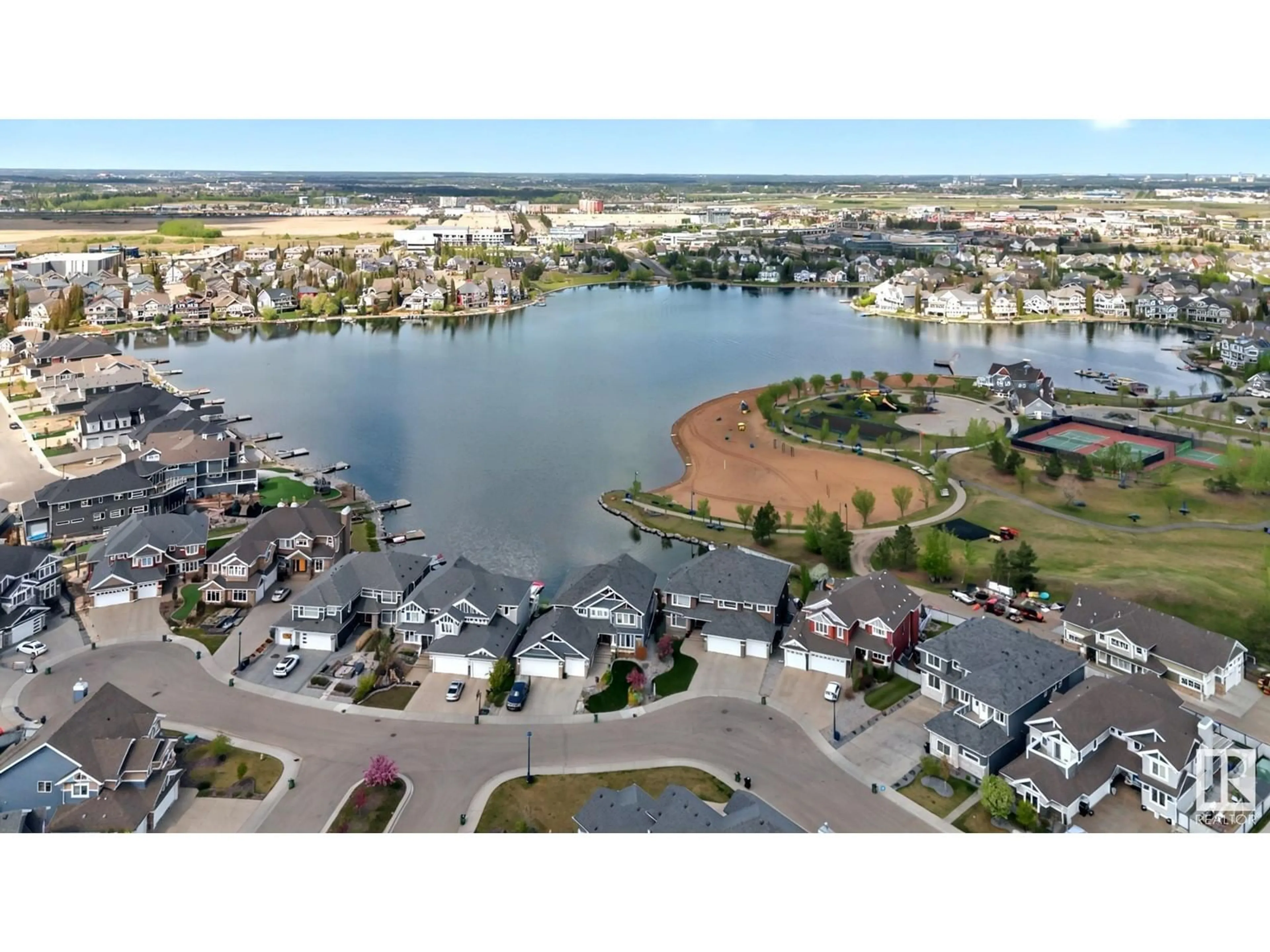 A pic from outside/outdoor area/front of a property/back of a property/a pic from drone, water/lake/river/ocean view for SW - 8233 24 AV, Edmonton Alberta T6X2J7