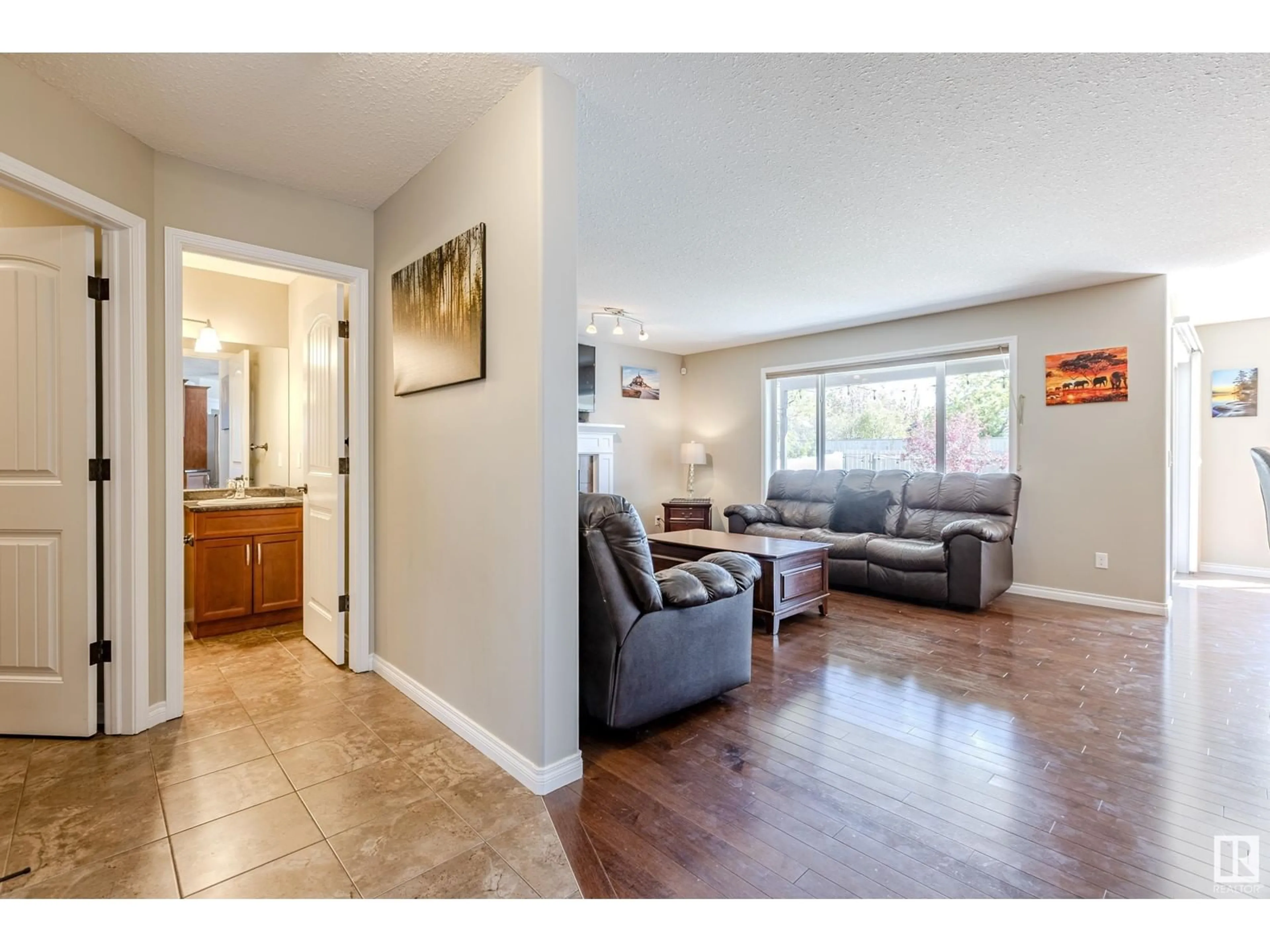 Living room with furniture, unknown for 505 GRANDIN DR, Morinville Alberta T8R0E3