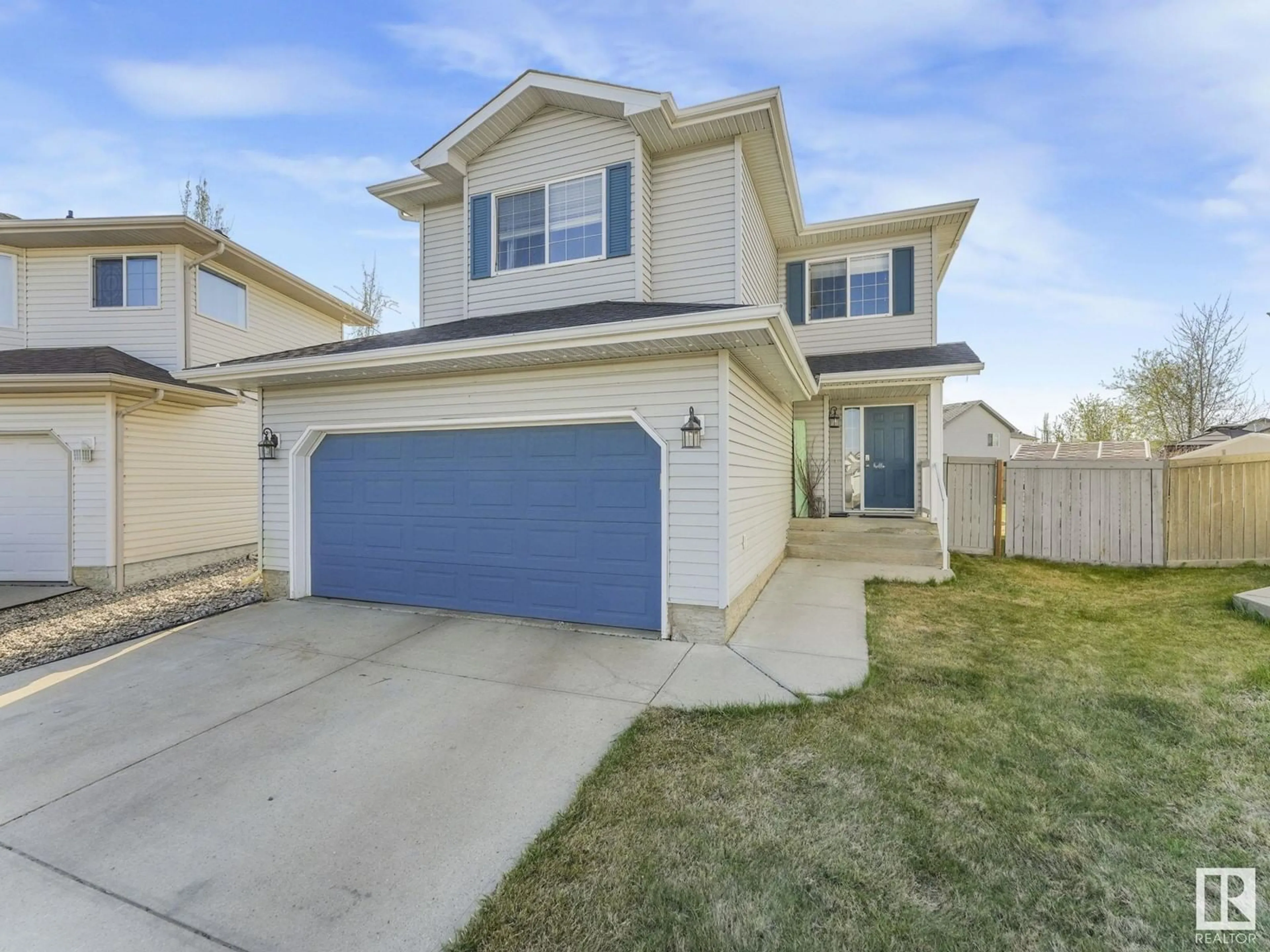 Home with vinyl exterior material, street for 3250 23 ST, Edmonton Alberta T6T2A8