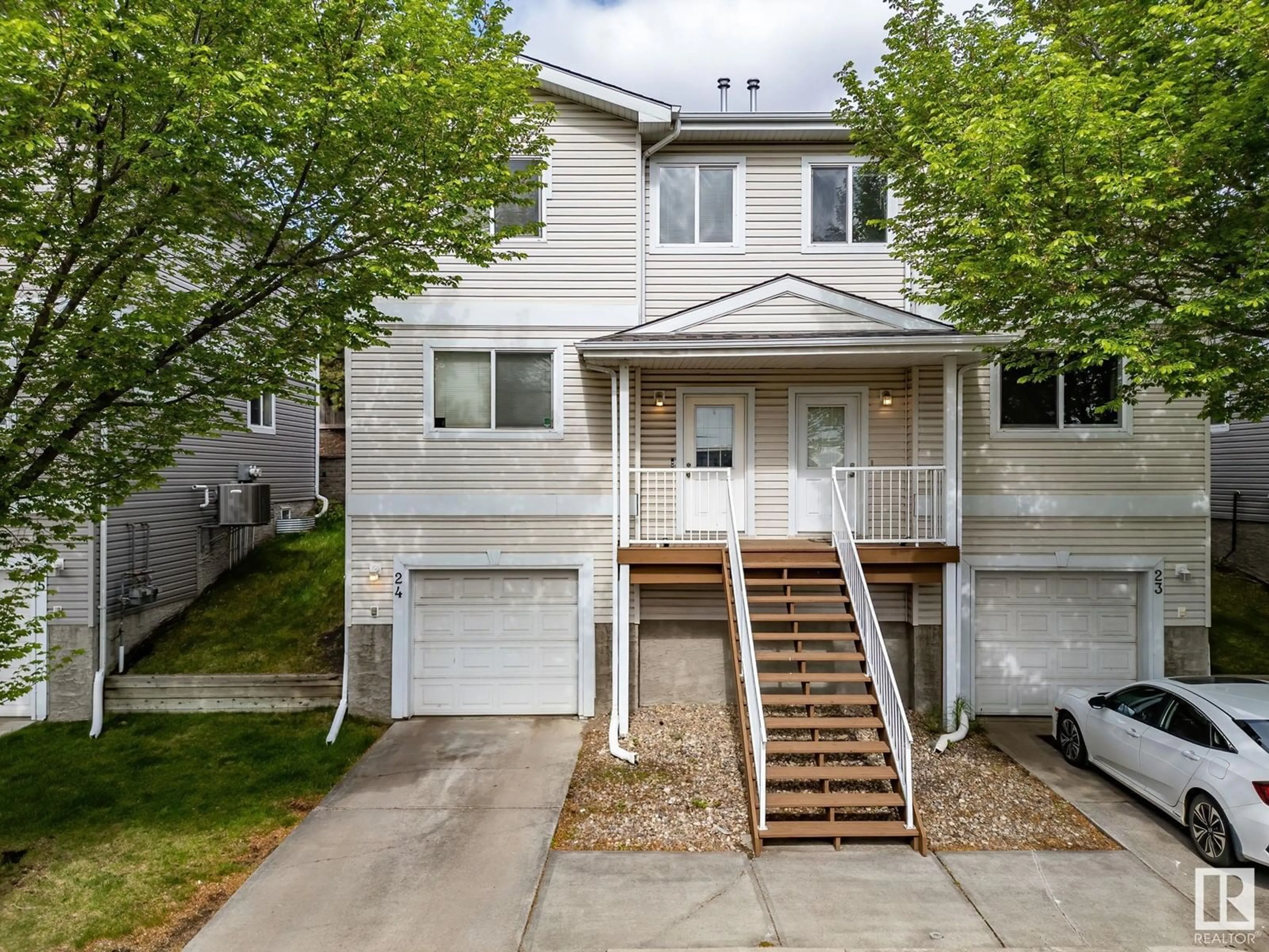 Home with vinyl exterior material, street for 130 - 24 HYNDMAN CRESCENT, Edmonton Alberta T5A0E8