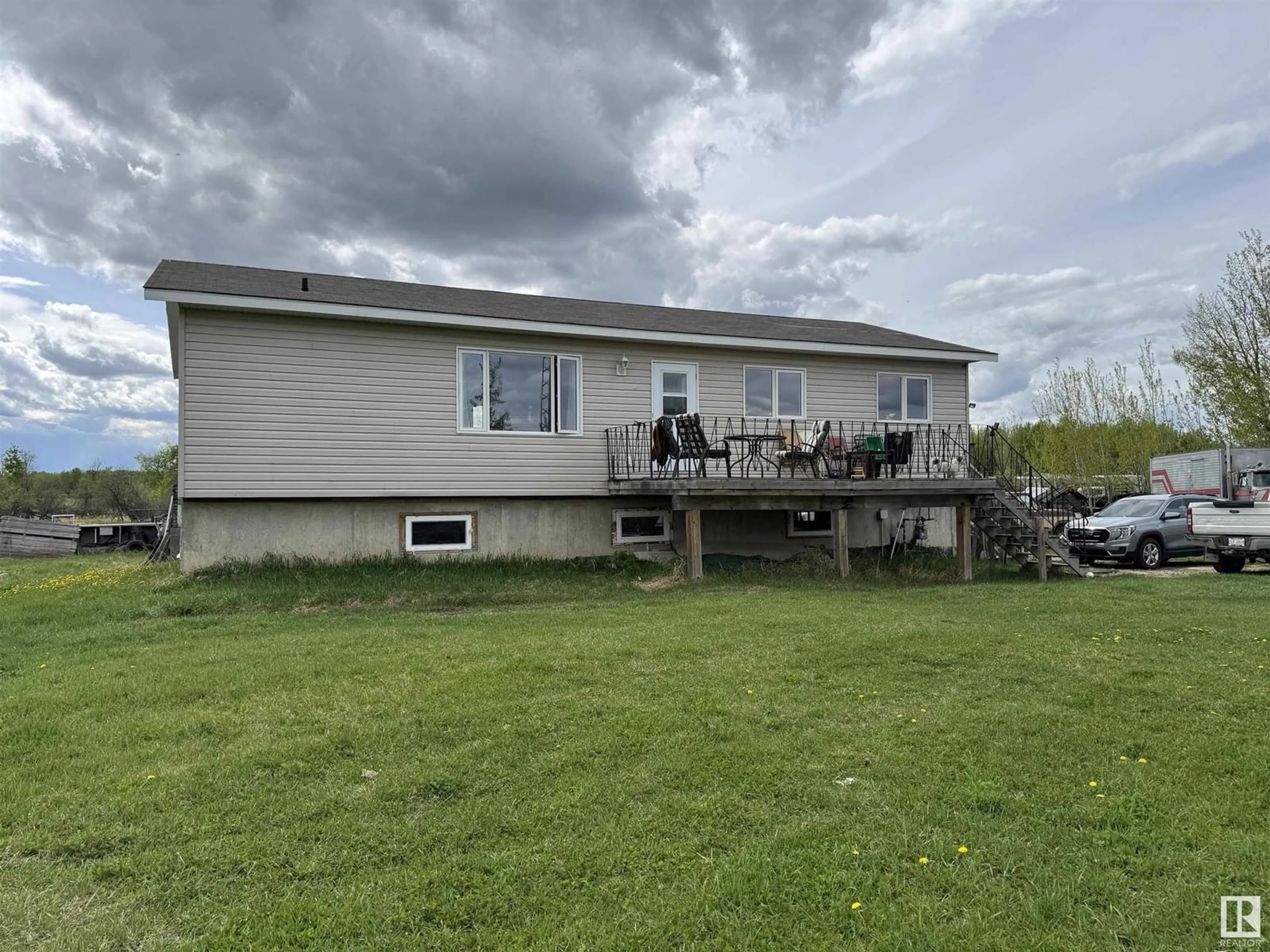 A pic from outside/outdoor area/front of a property/back of a property/a pic from drone, water/lake/river/ocean view for 5519 HWY 616, Rural Brazeau County Alberta T0C0S0
