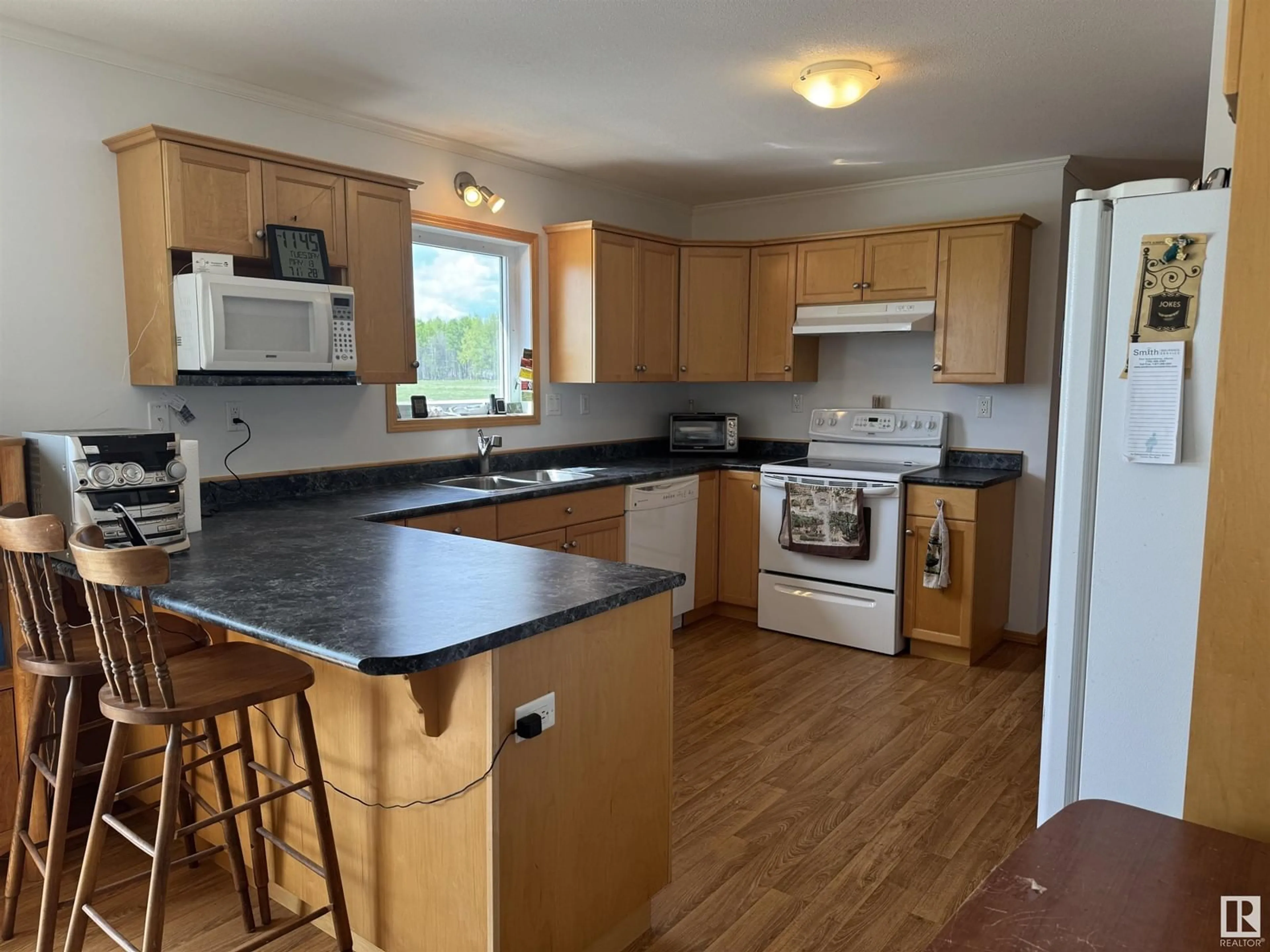 Standard kitchen, wood/laminate floor for 5519 HWY 616, Rural Brazeau County Alberta T0C0S0