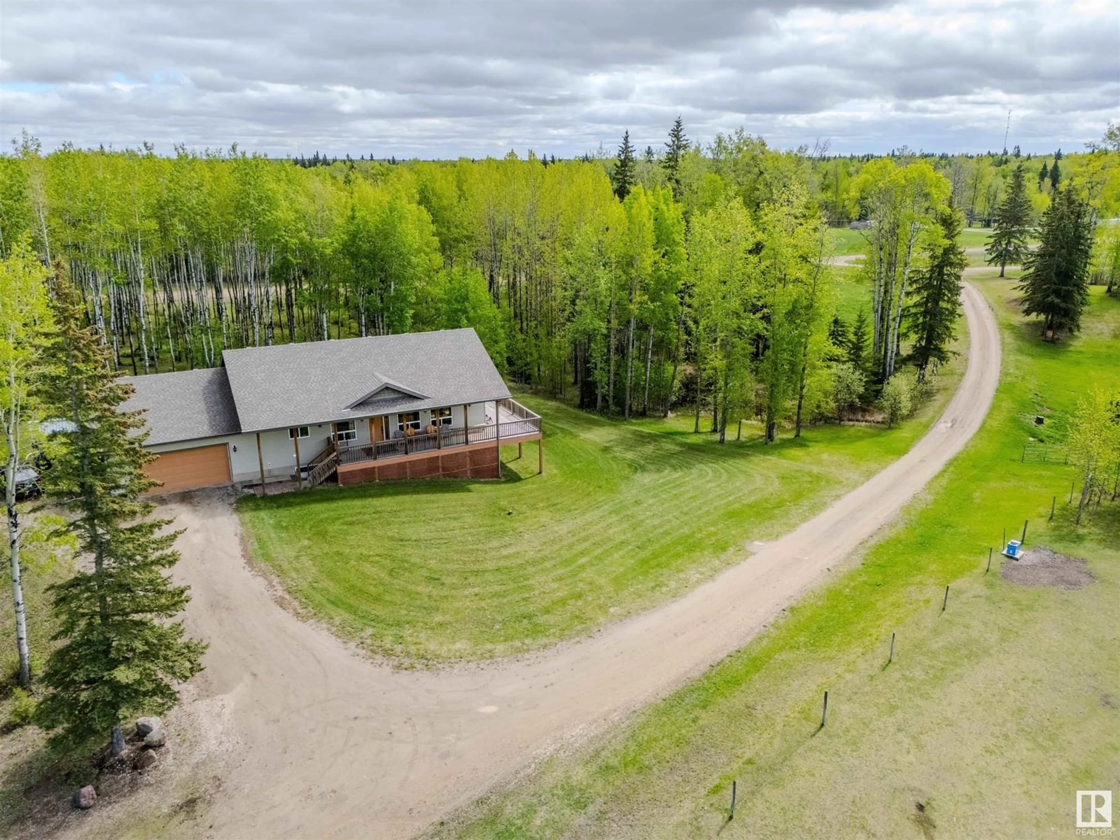 A pic from outside/outdoor area/front of a property/back of a property/a pic from drone, unknown for 53406 RGE ROAD 35 A, Rural Parkland County Alberta T0E2Y0