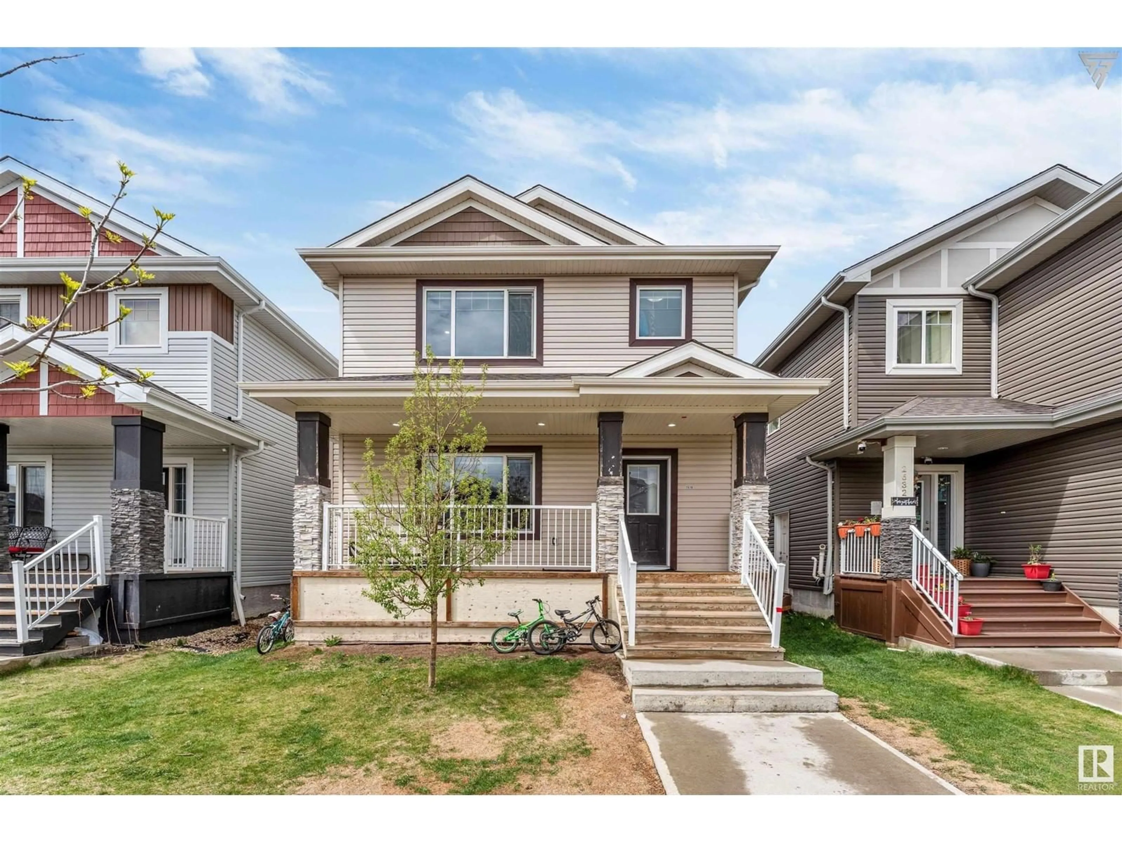 Home with vinyl exterior material, street for 2628 11 ST, Edmonton Alberta T6T0X9