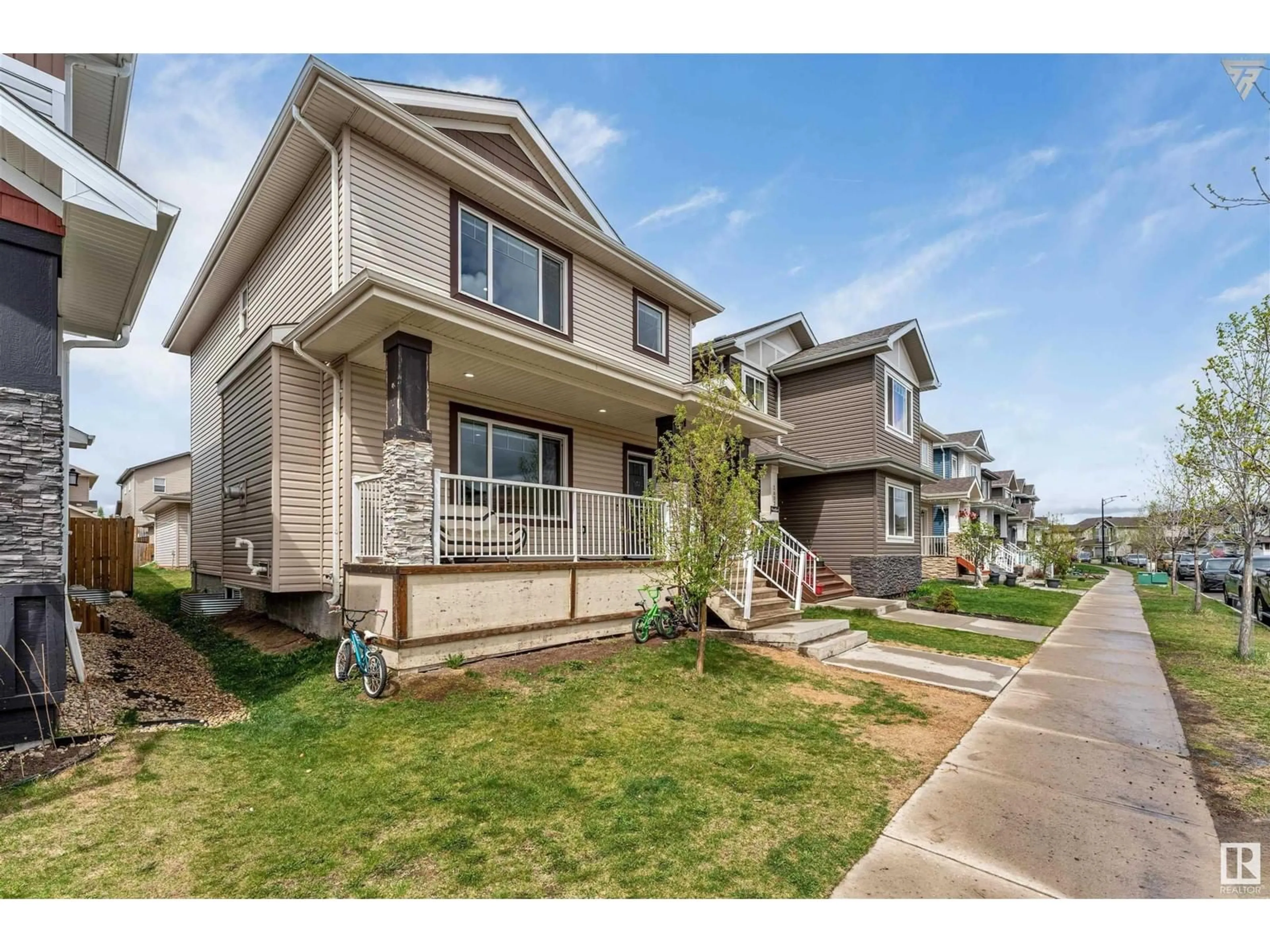 Home with vinyl exterior material, street for 2628 11 ST, Edmonton Alberta T6T0X9