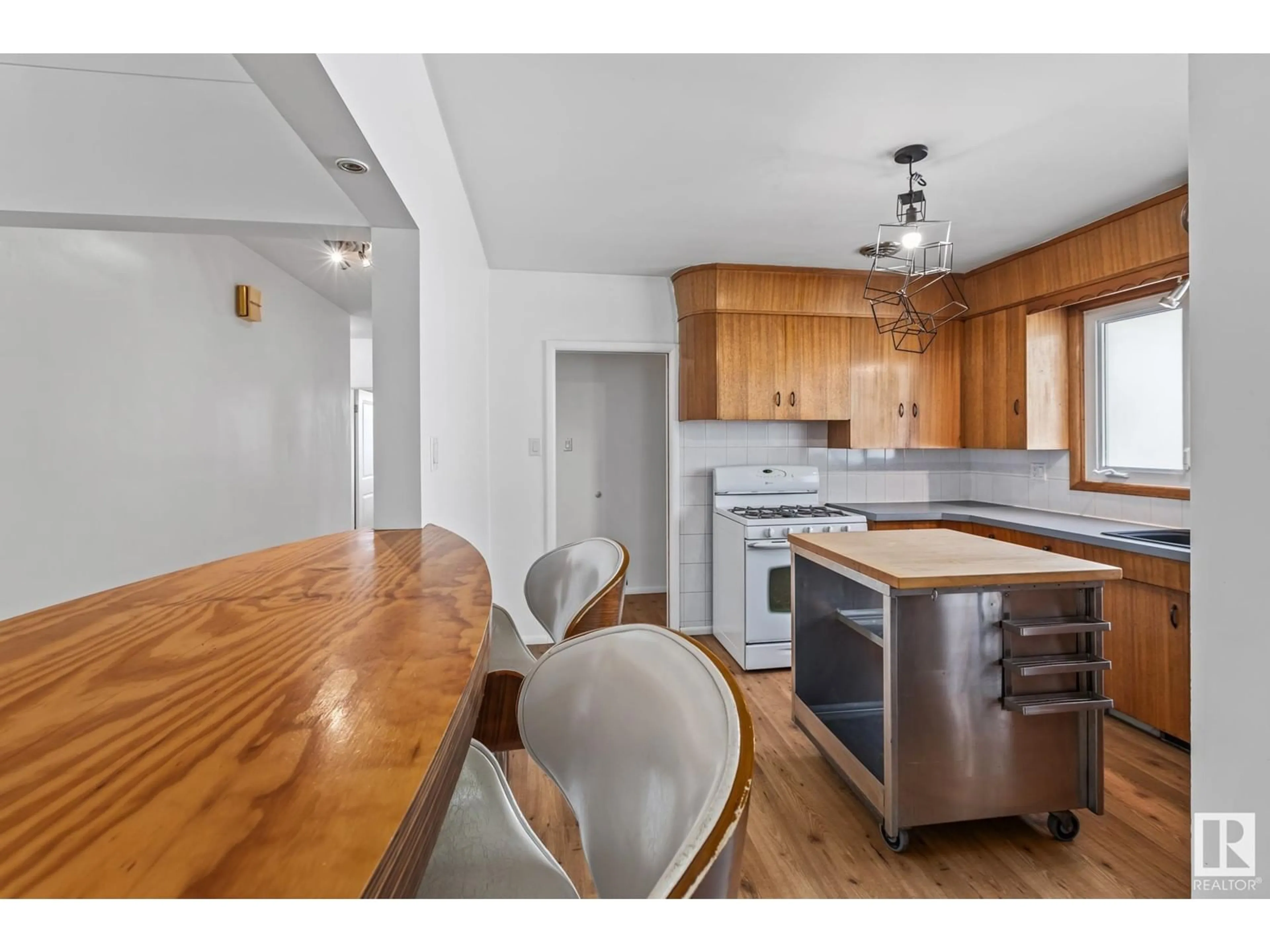 Open concept kitchen, wood/laminate floor for 9539 64 AV, Edmonton Alberta T6E0J1