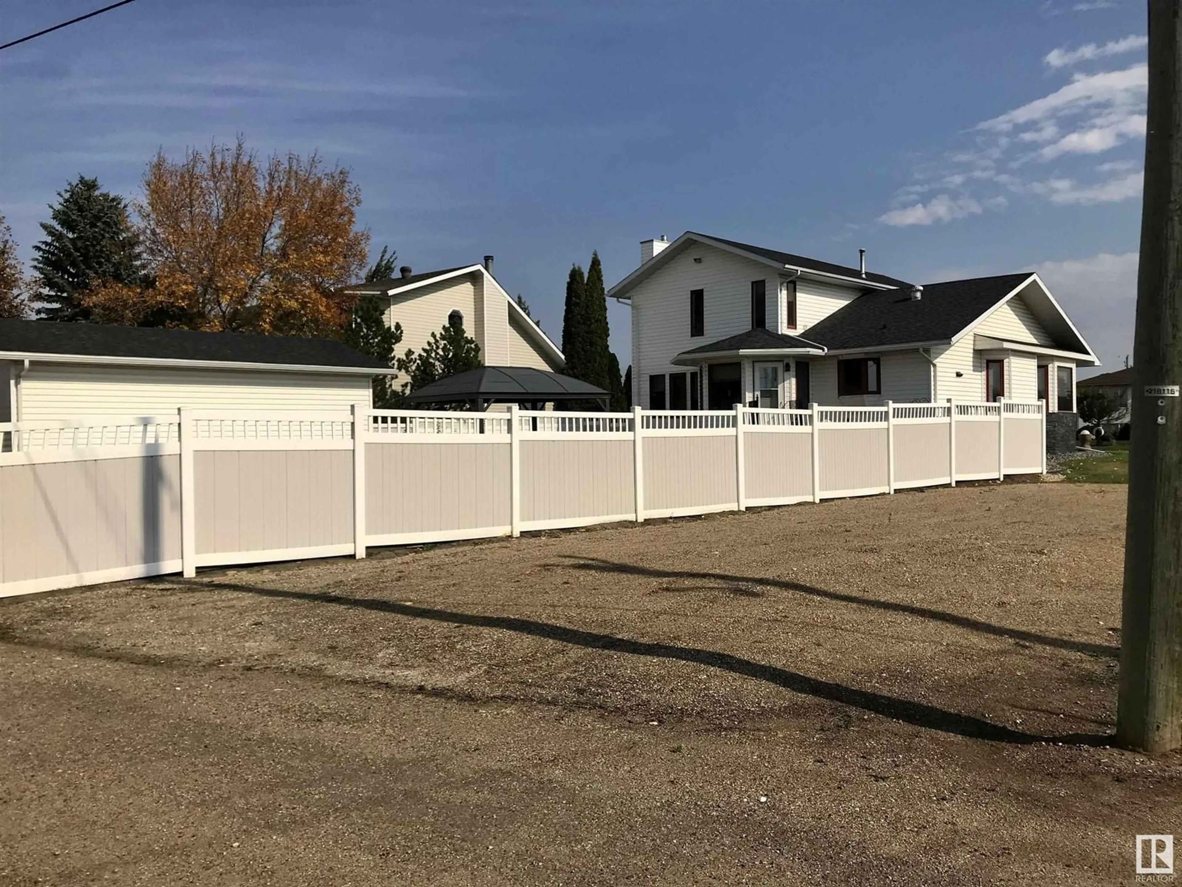 Home with vinyl exterior material, street for 5806 57 ST, Vegreville Alberta T9C1J1
