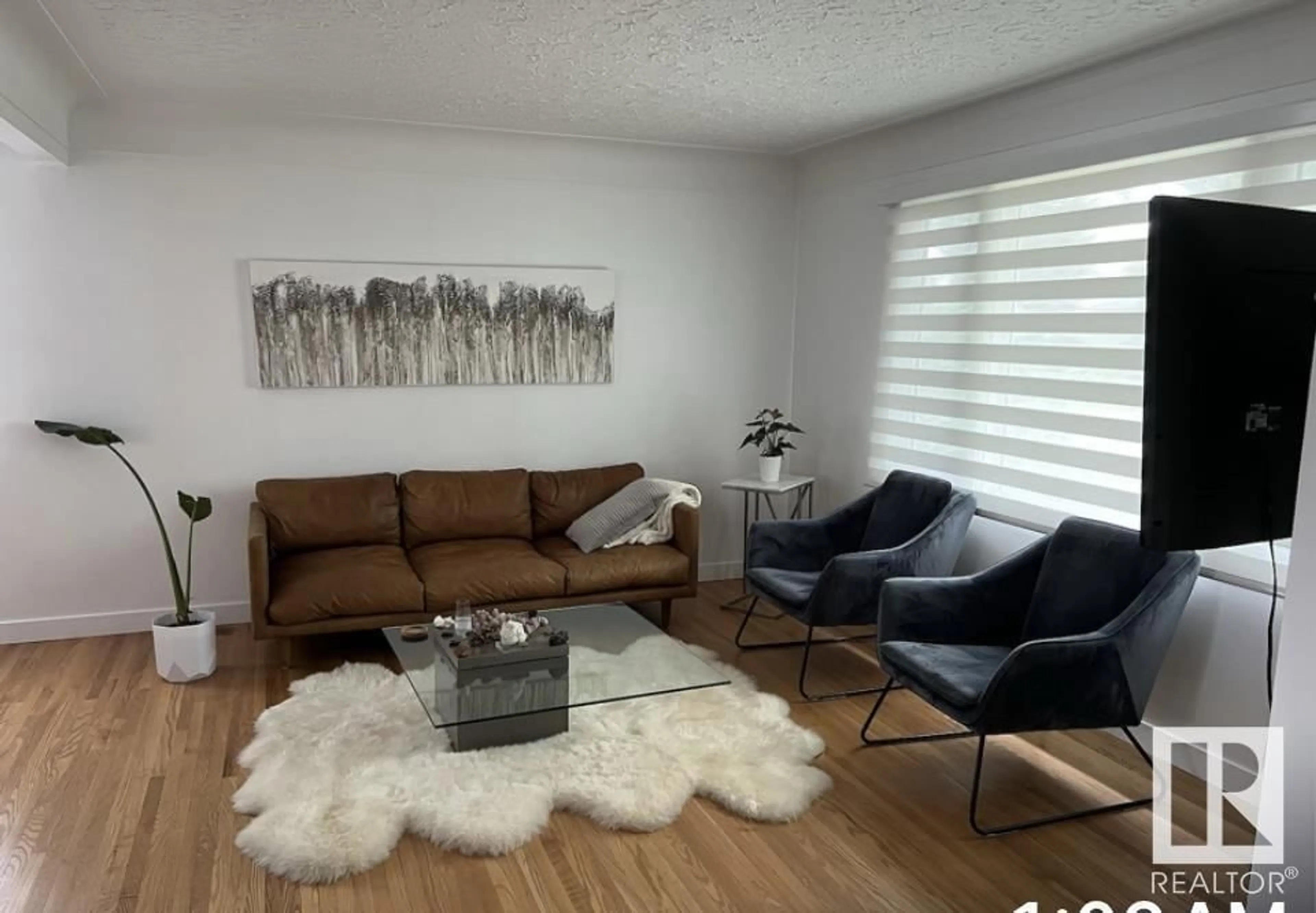 Living room with furniture, unknown for NW - 8528 64 AV, Edmonton Alberta T6E0H3