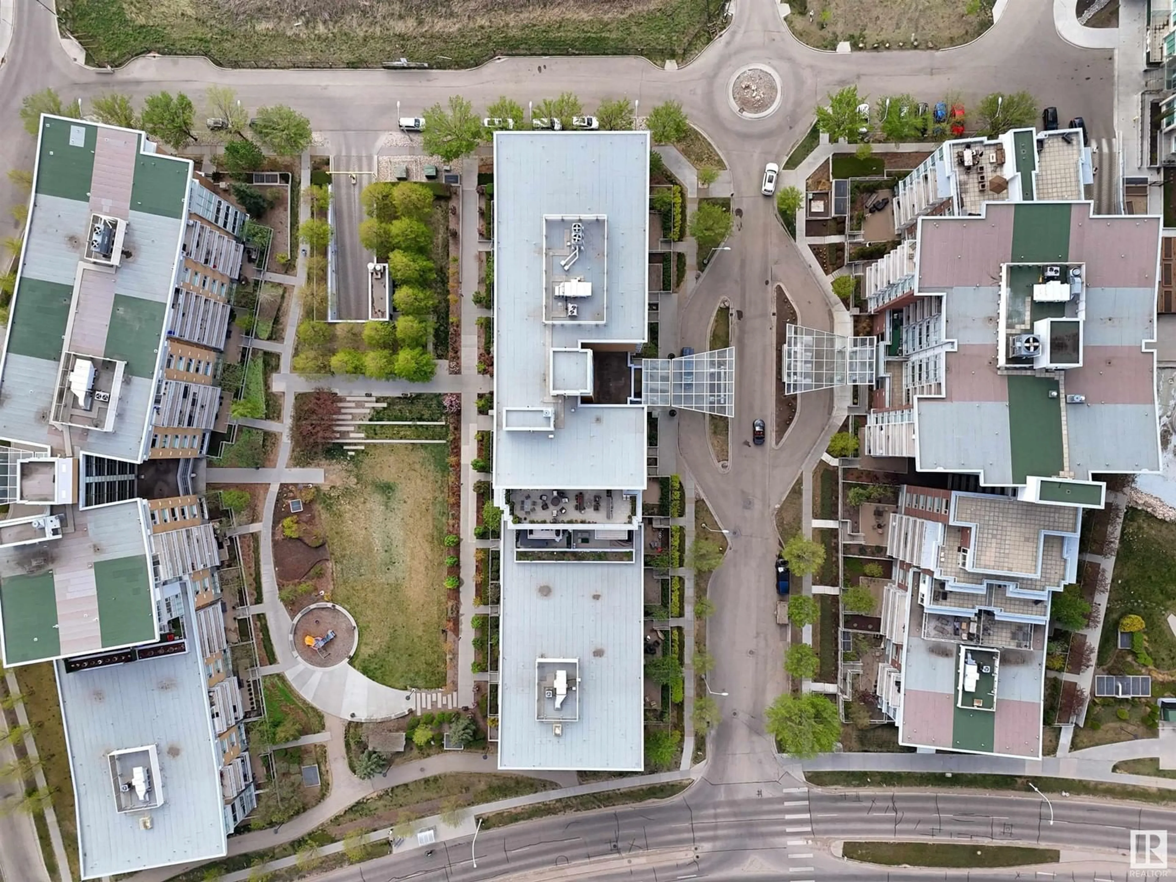 A pic from outside/outdoor area/front of a property/back of a property/a pic from drone, street for 608 - 2510 109 ST NW, Edmonton Alberta T6J2X1