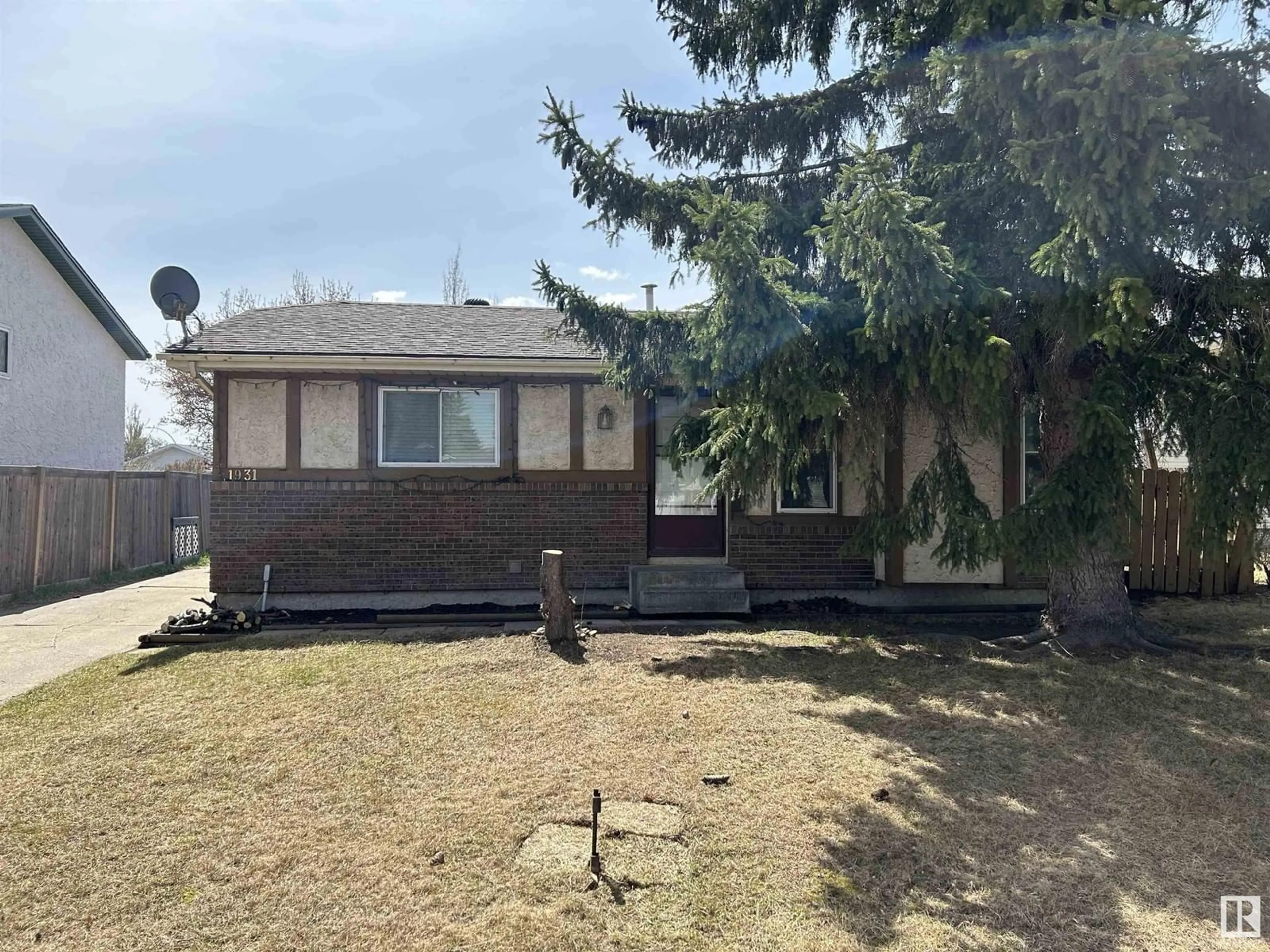 A pic from outside/outdoor area/front of a property/back of a property/a pic from drone, street for 1931 145A AV, Edmonton Alberta T5Y1S9
