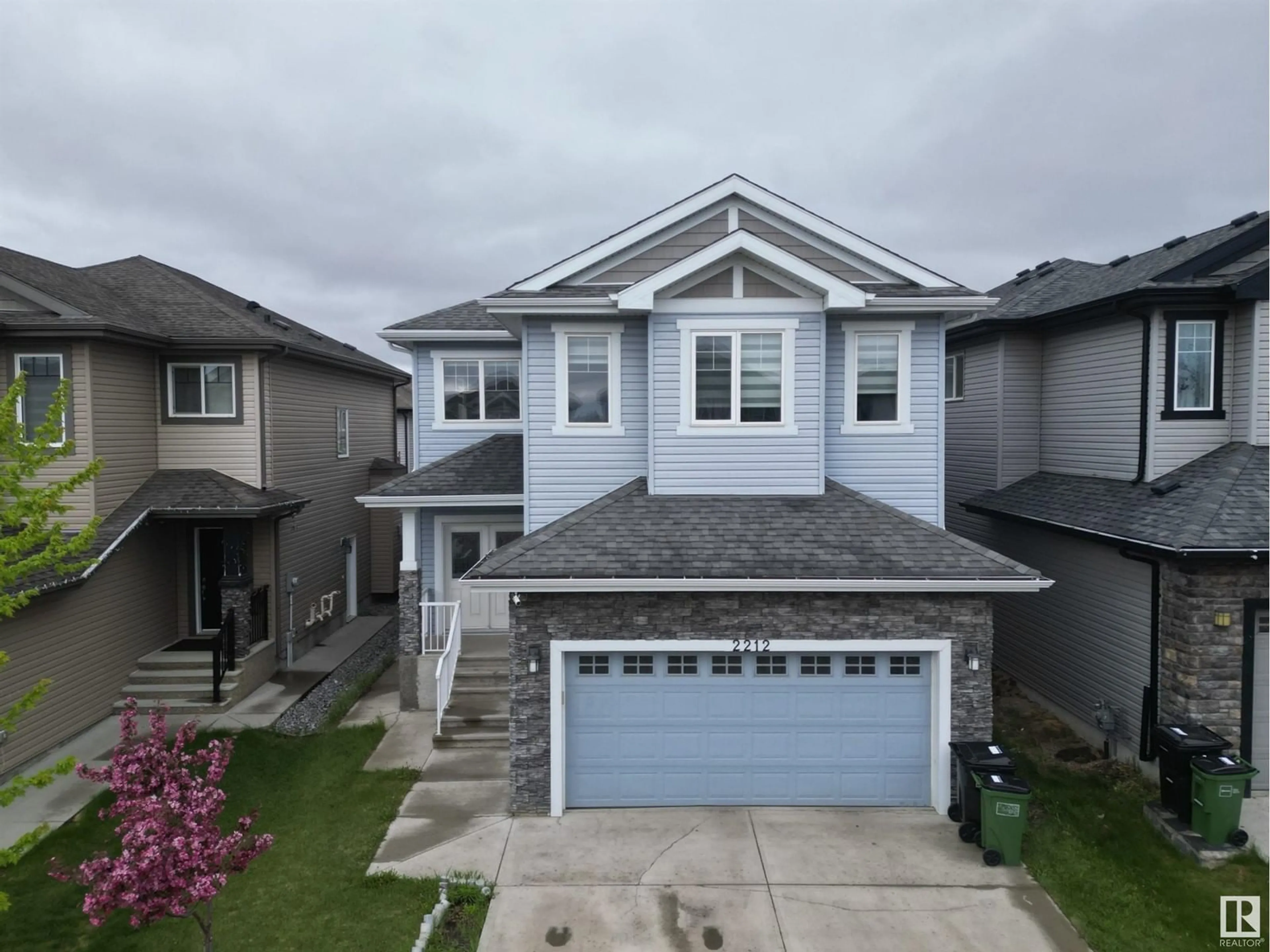 A pic from outside/outdoor area/front of a property/back of a property/a pic from drone, street for 2212 22 ST, Edmonton Alberta T6T0Z1