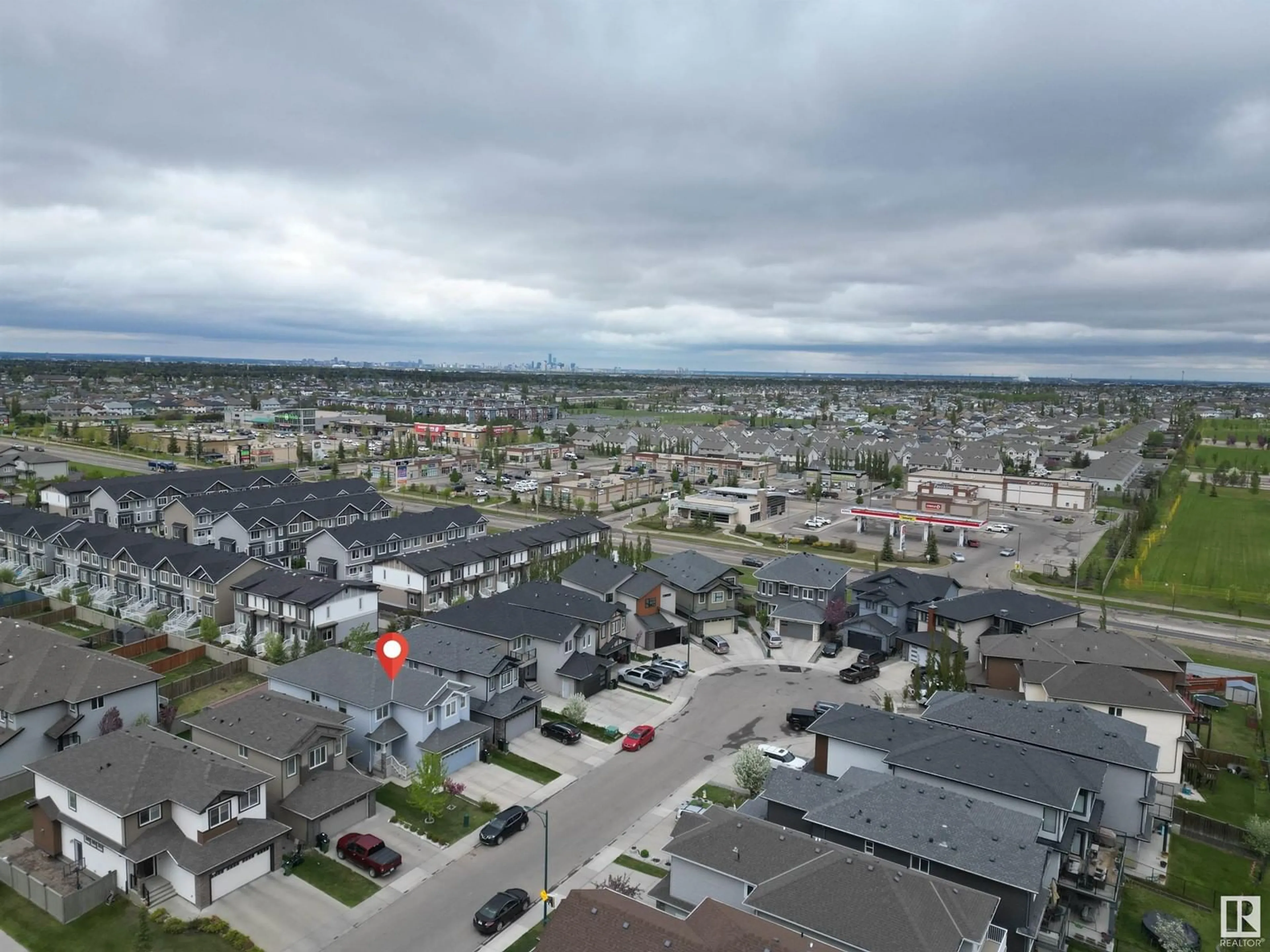 A pic from outside/outdoor area/front of a property/back of a property/a pic from drone, street for 2212 22 ST, Edmonton Alberta T6T0Z1