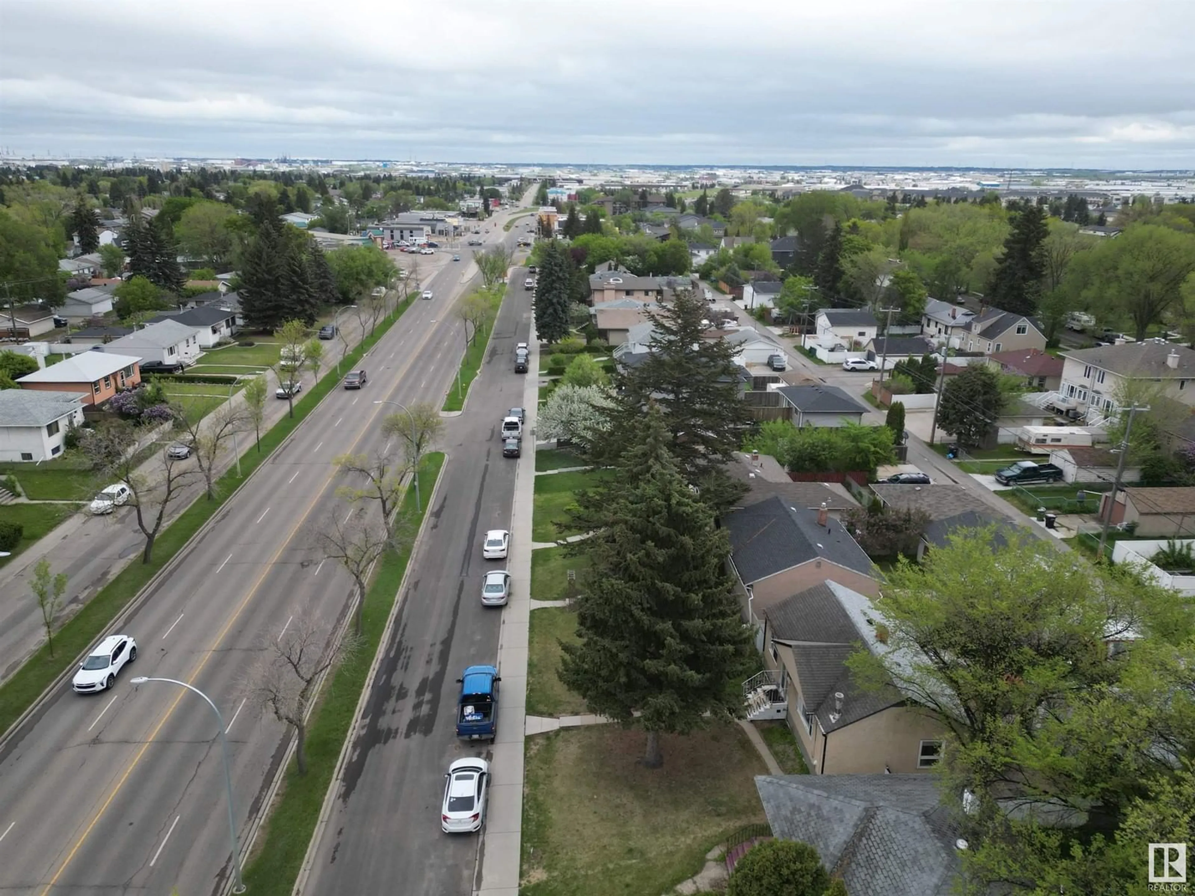 A pic from outside/outdoor area/front of a property/back of a property/a pic from drone, street for 7723 82 AV, Edmonton Alberta T6C0X8