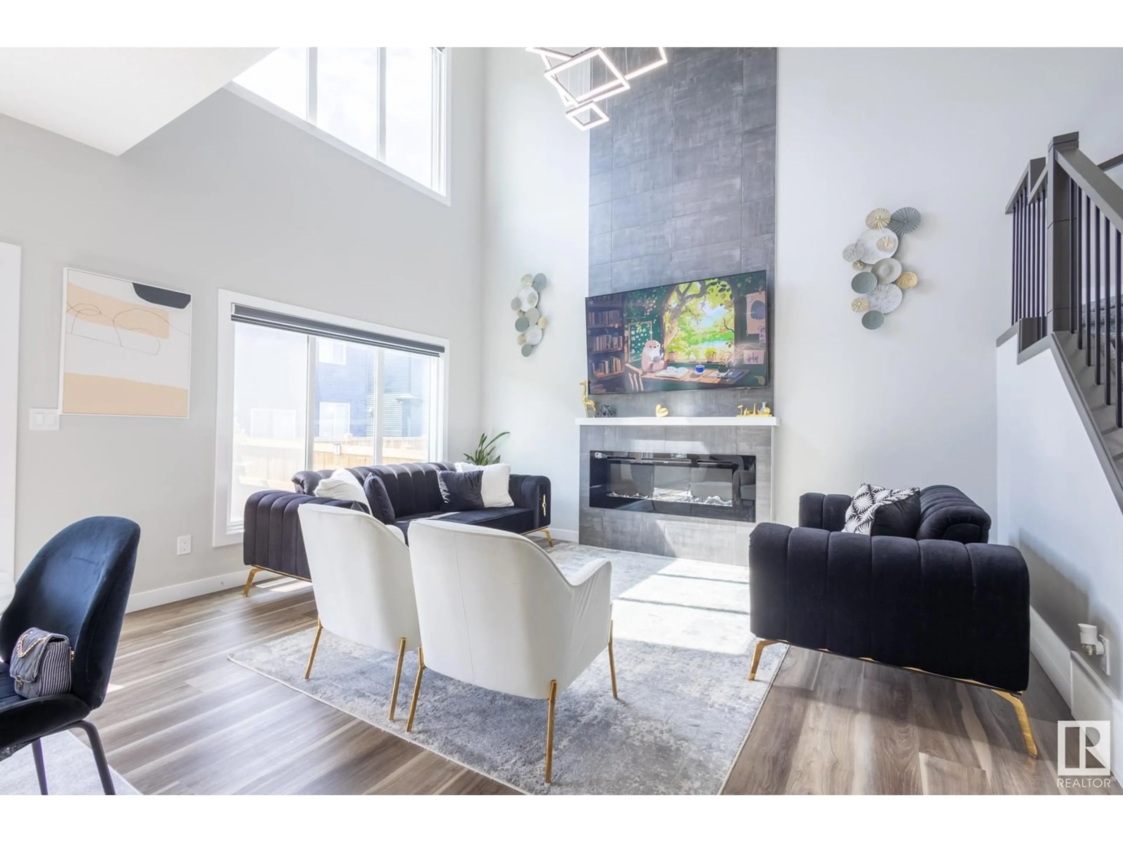 Living room with furniture, wood/laminate floor for 5745 KOOTOOK WY, Edmonton Alberta T6W4V9