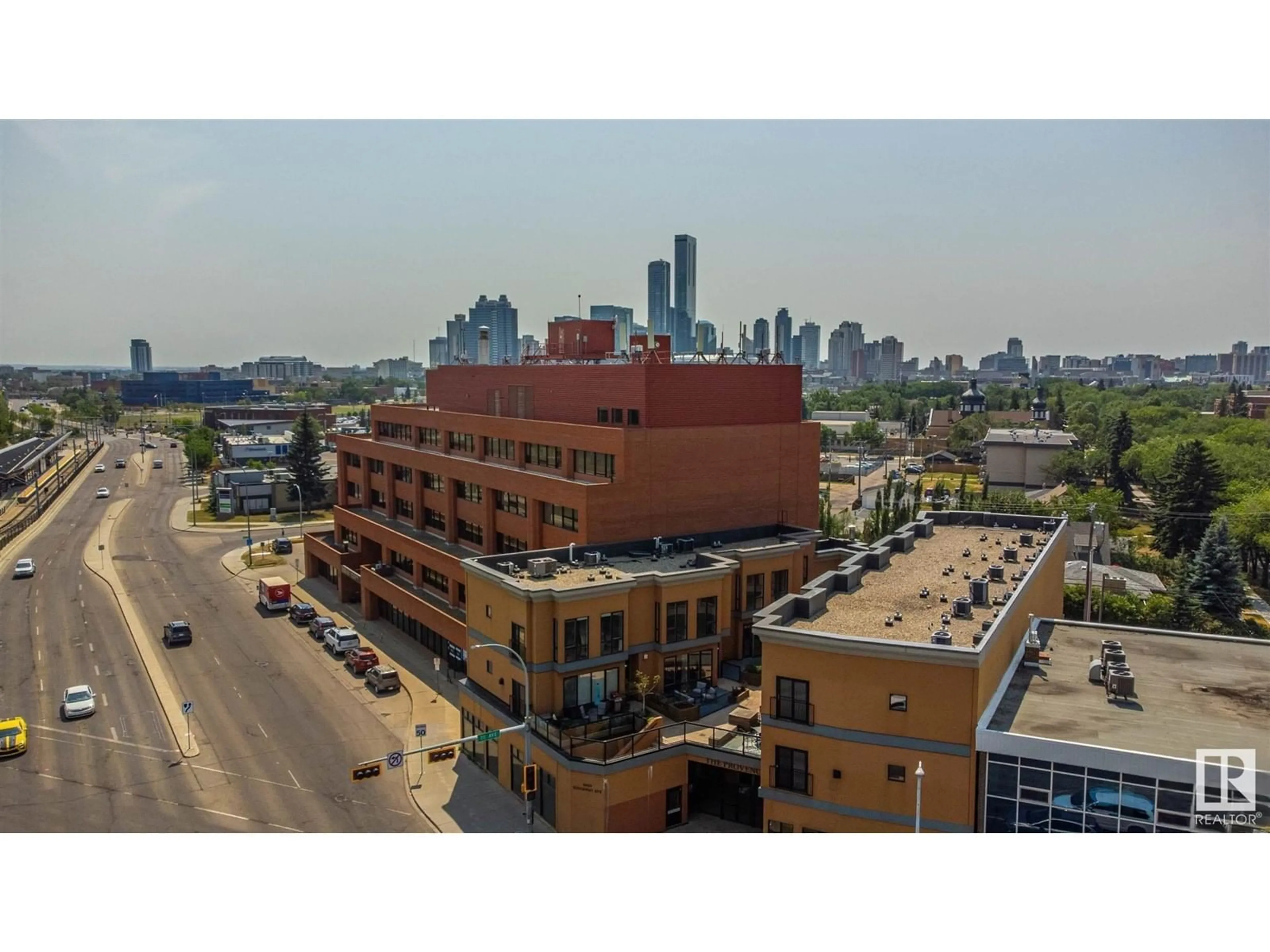 A pic from outside/outdoor area/front of a property/back of a property/a pic from drone, city buildings view from balcony for #209 - 10625 KINGSWAY AV, Edmonton Alberta T5G2Z6