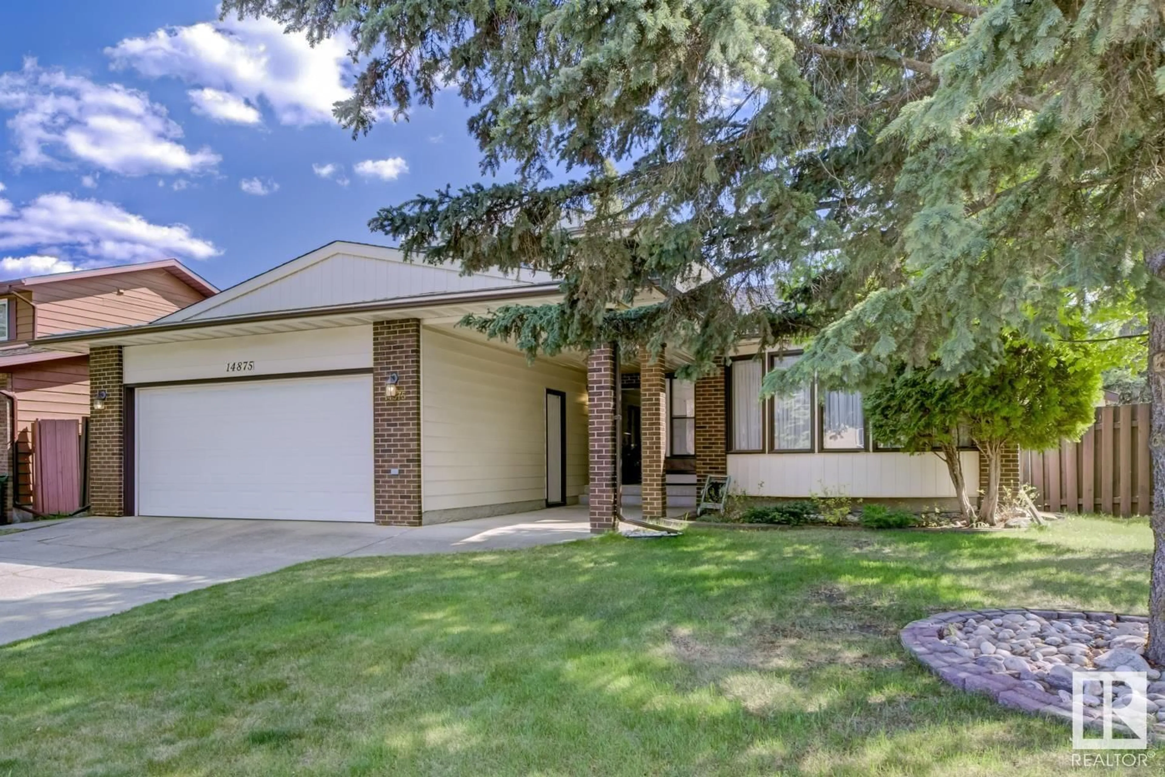 Home with brick exterior material, street for 14875 43 AV, Edmonton Alberta T6H5V5