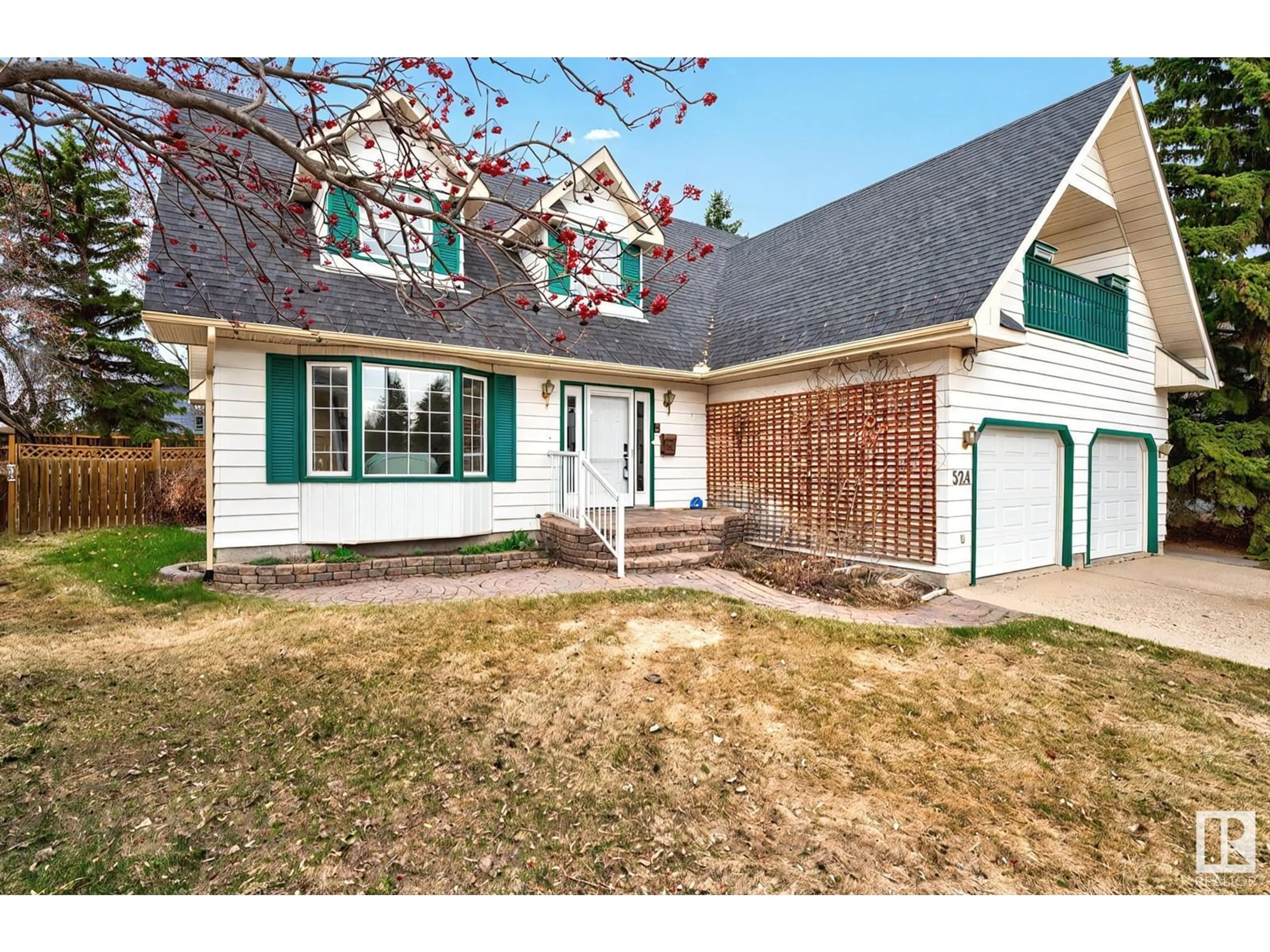 Home with vinyl exterior material, street for 524 WAHSTAO RD, Edmonton Alberta T5T2Y1