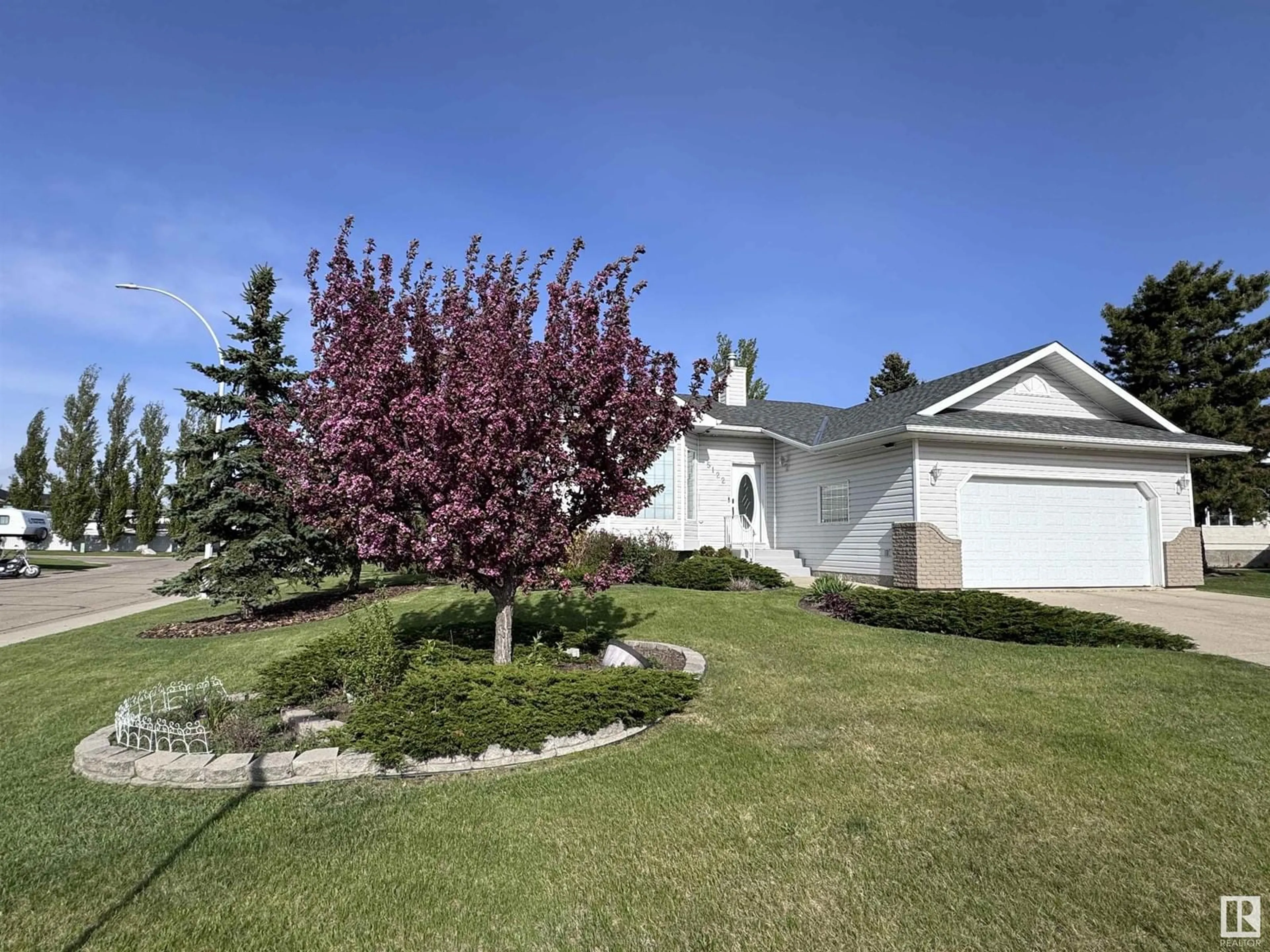 A pic from outside/outdoor area/front of a property/back of a property/a pic from drone, street for 5122 52 AV, Legal Alberta T0G1L0